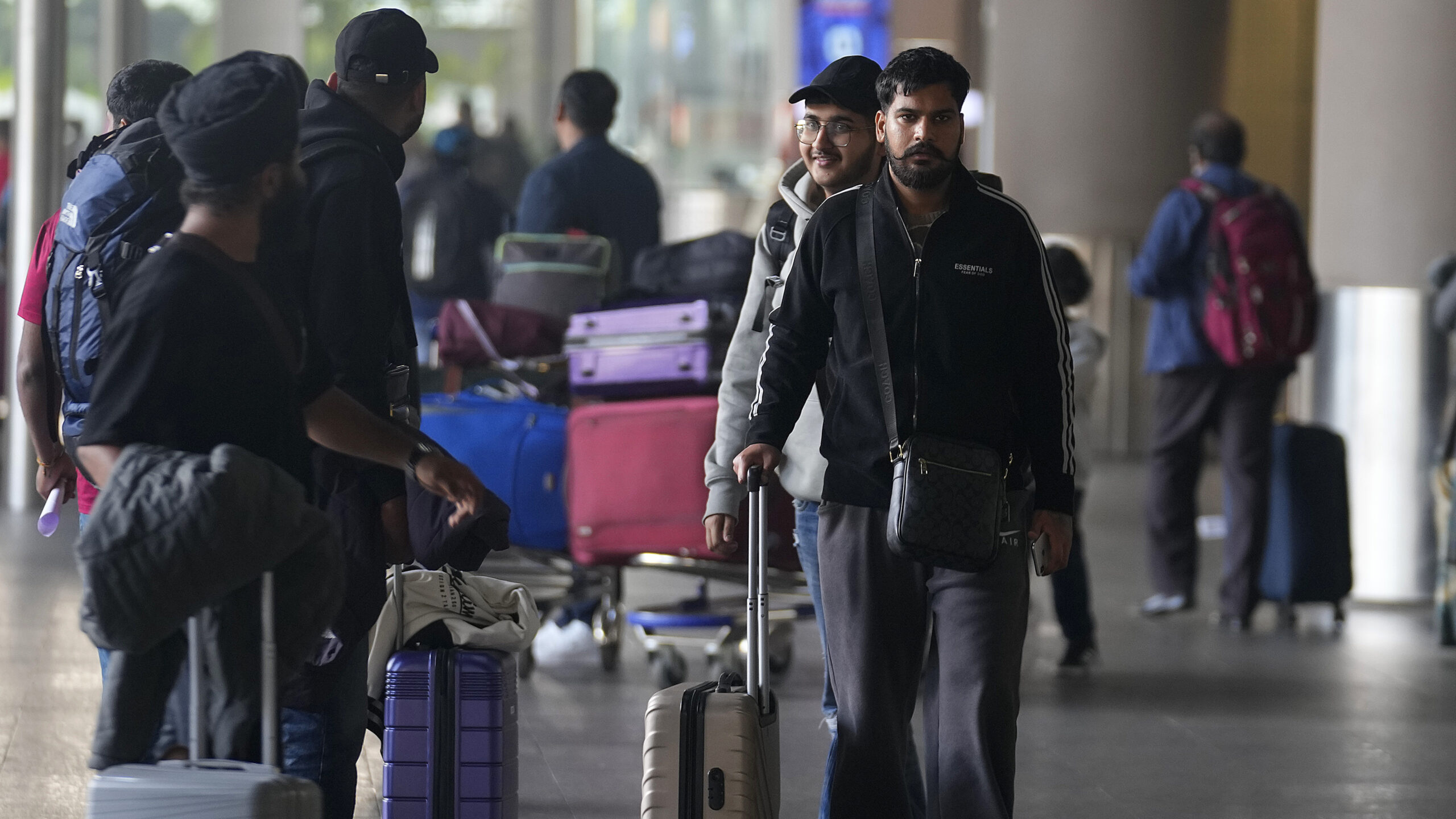 276 Indians stuck in a French airport for a human trafficking probe arrive in India