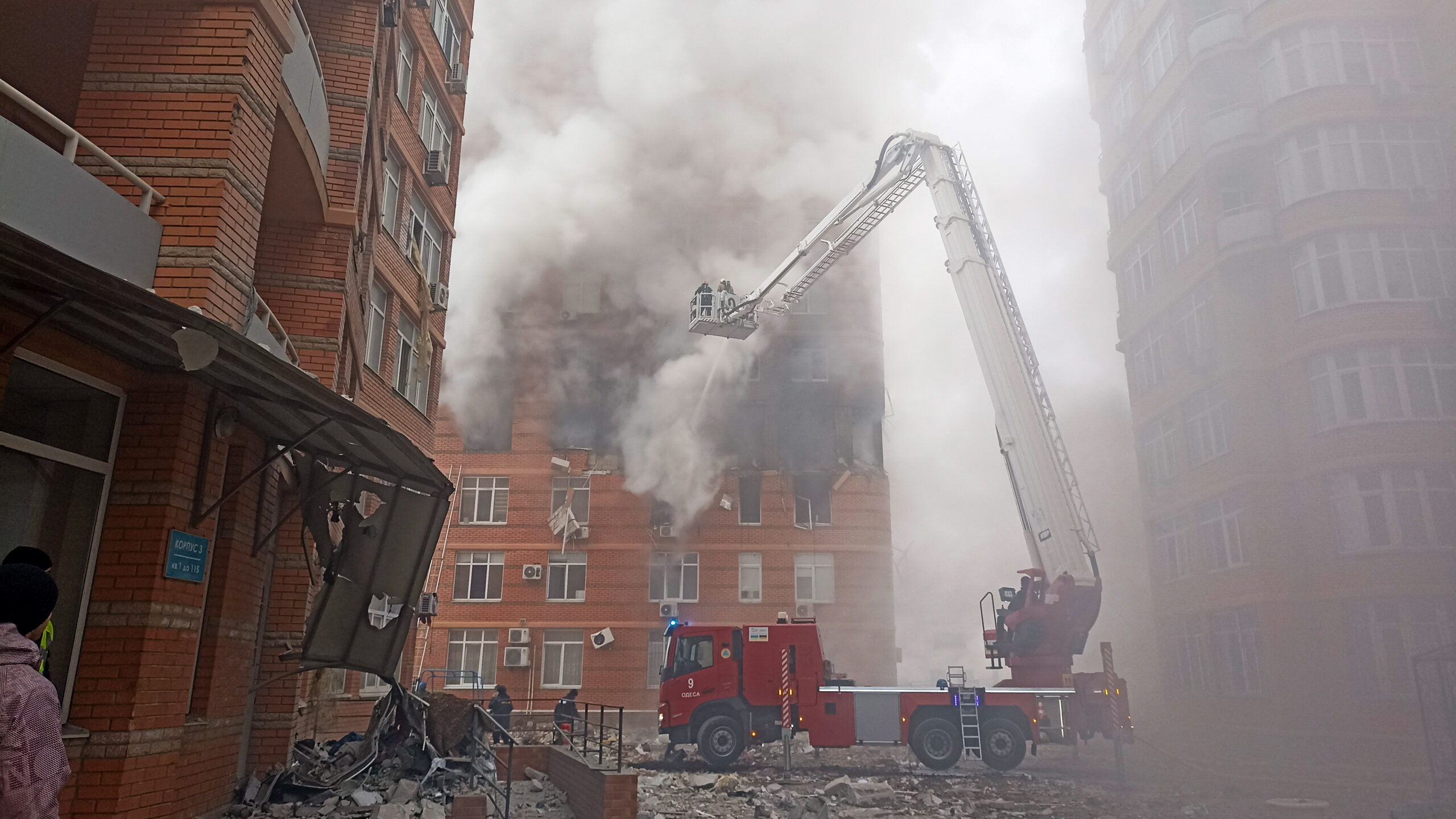 Odesa: Firefighters work to extinguish a fire at a damaged apartment building.