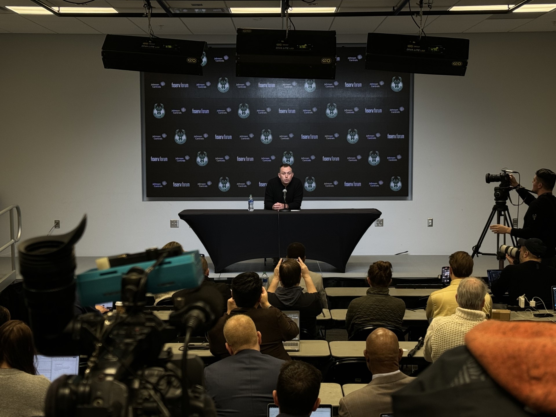 Bucks General Manager Jon Horst talks to the press.