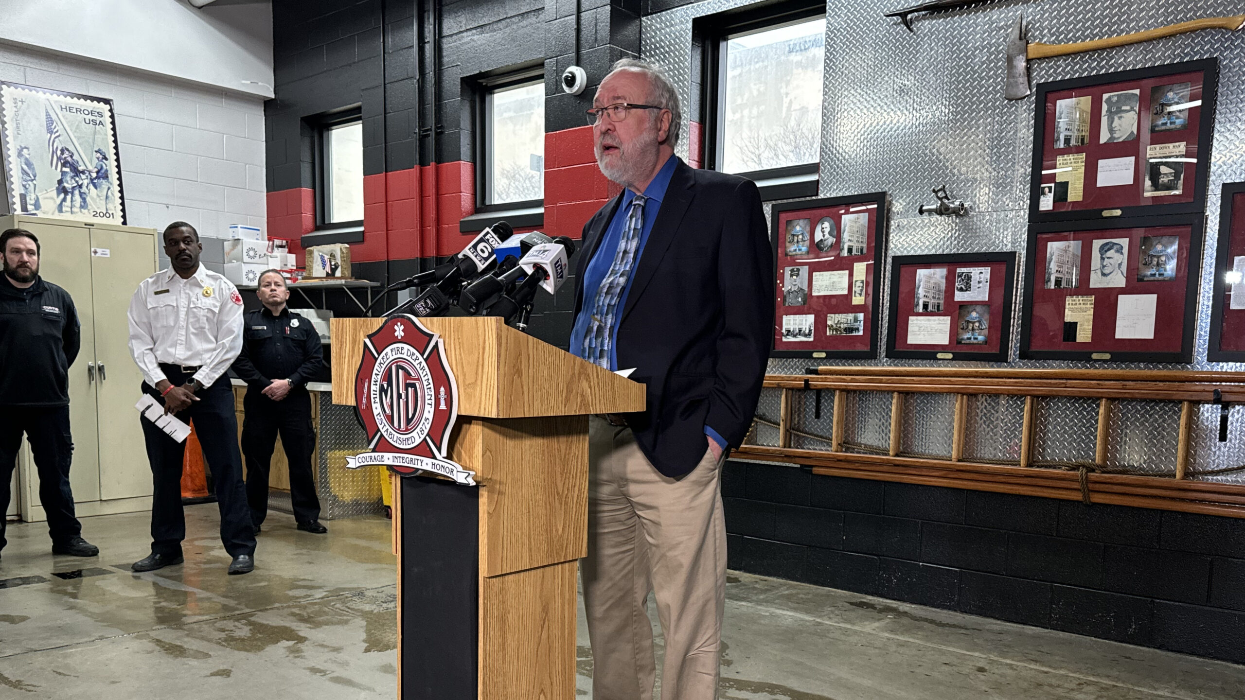 Curtis Ambulance CEO James Baker stands at a podium.