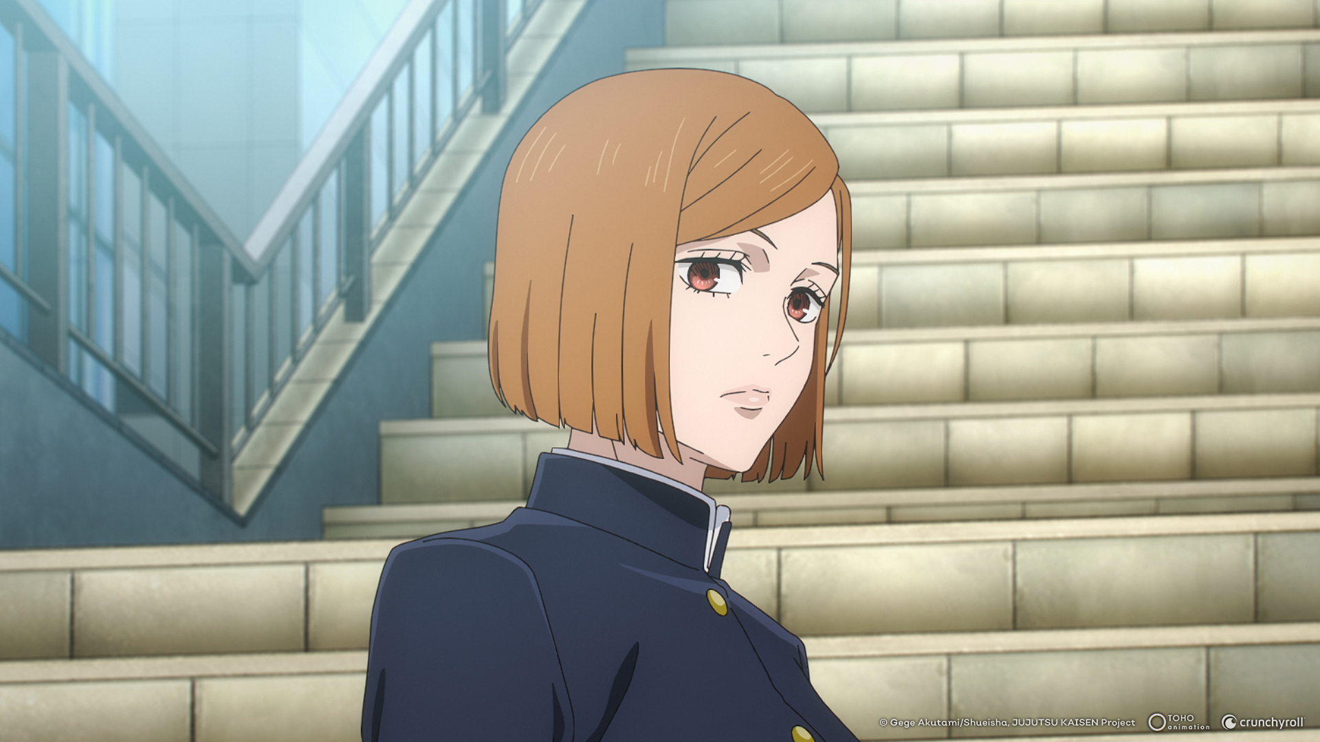 The anime character Nobara Kugisaki stands in front of stairs in the series "Jujutsu Kaisen."