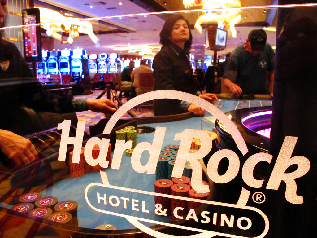 a roulette dealer waits for bets to be placed at the Hard Rock casino