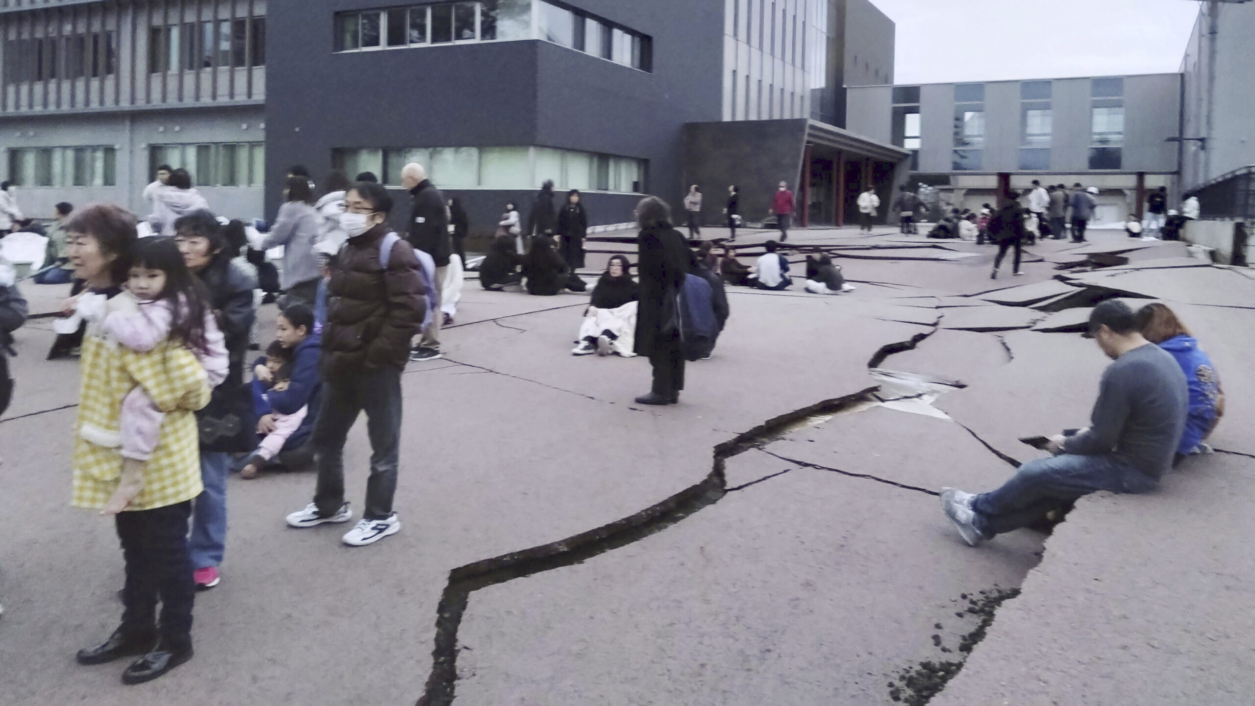 Cracks are seen on the ground in Wajima, Ishikawa prefecture, Japan on Monday following an earthquake. Japan issued