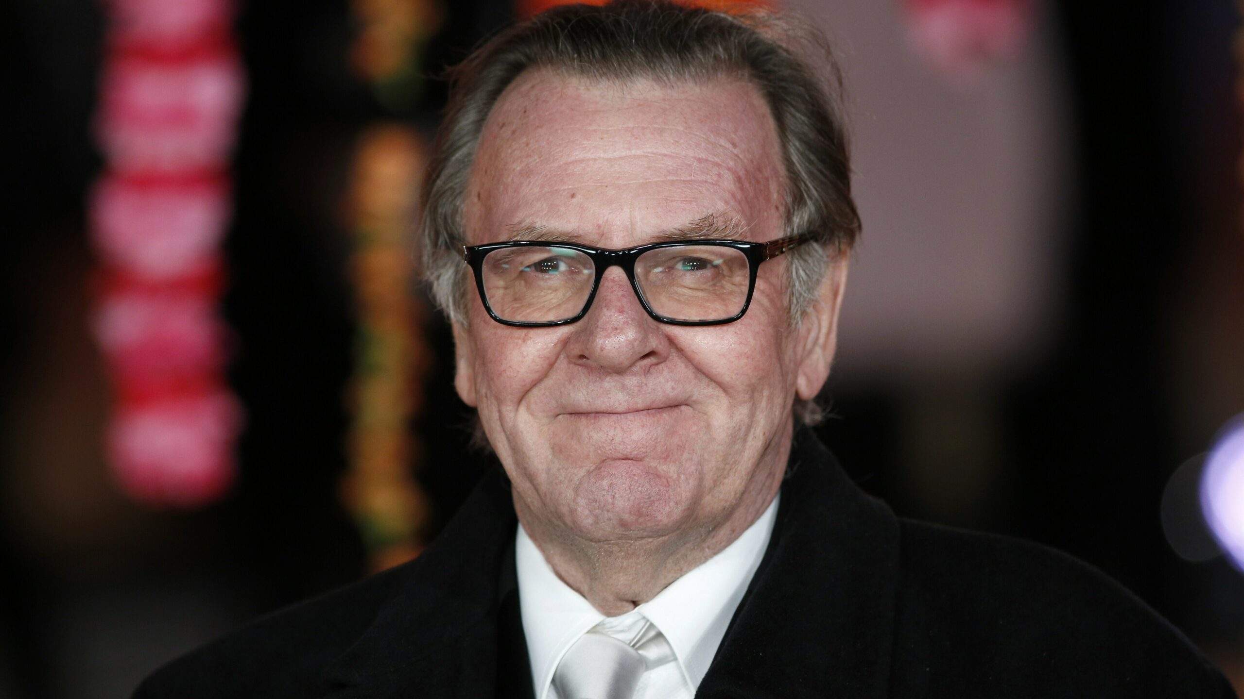 English actor Tom Wilkinson poses for photographers on the red carpet ahead of the Royal and World Premiere of the film