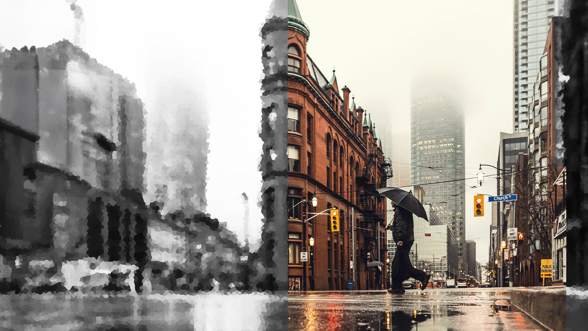 A man crosses a blurry street holding an umbrella