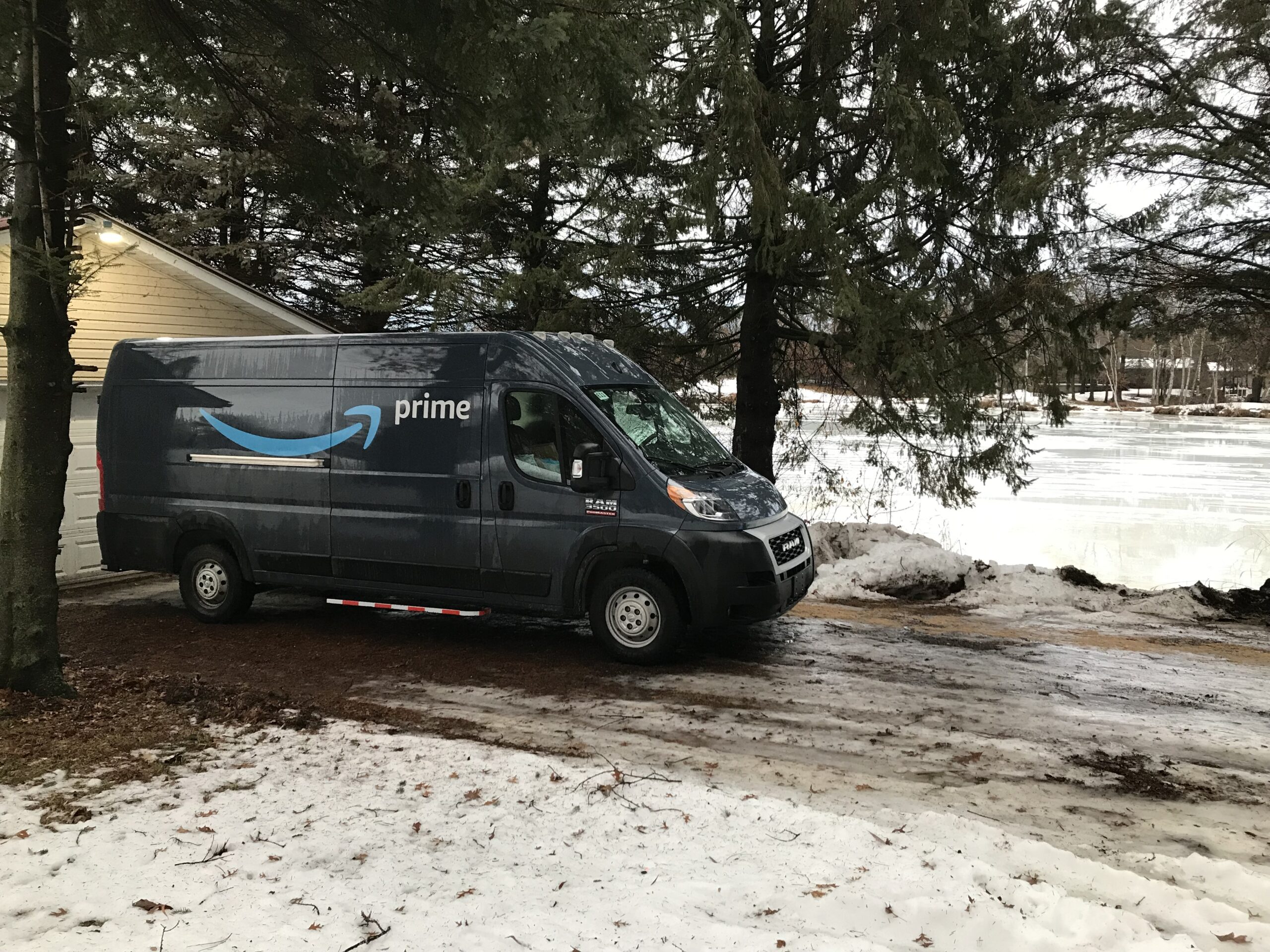 Photo of a stranded Amazon delivery van on an icy driveway
