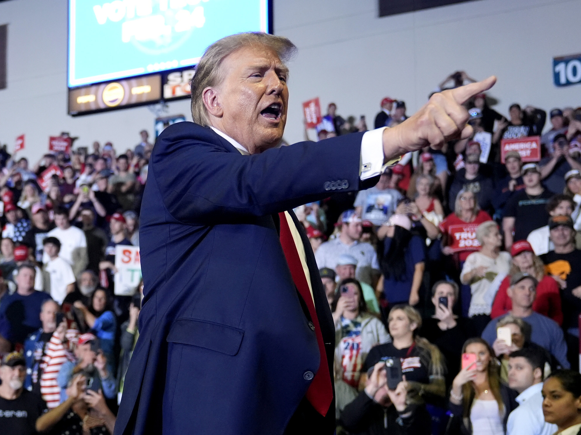 Republican presidential candidate former President Donald Trump gestures to the crowd after speaking at a Get Out The Vote rally at Coastal Carolina University in Conway, S.C., Saturday, Feb. 10.