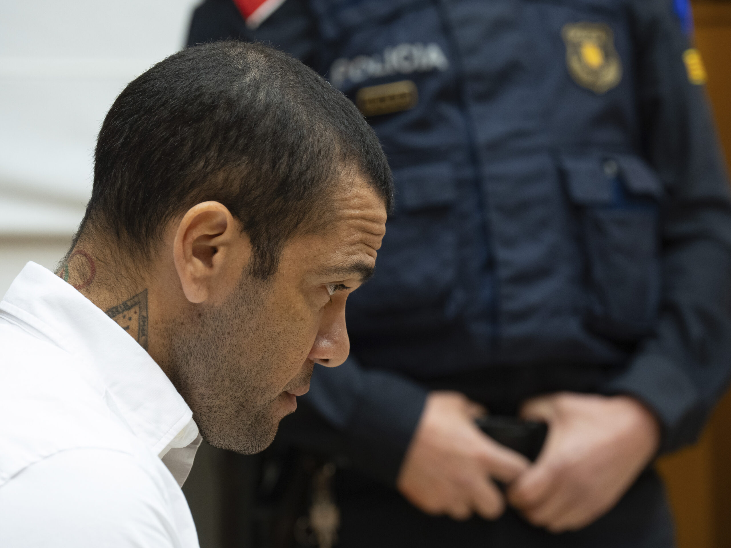 Soccer star Dani Alves is found guilty of rape and sentenced to 4 1/2 years in prison