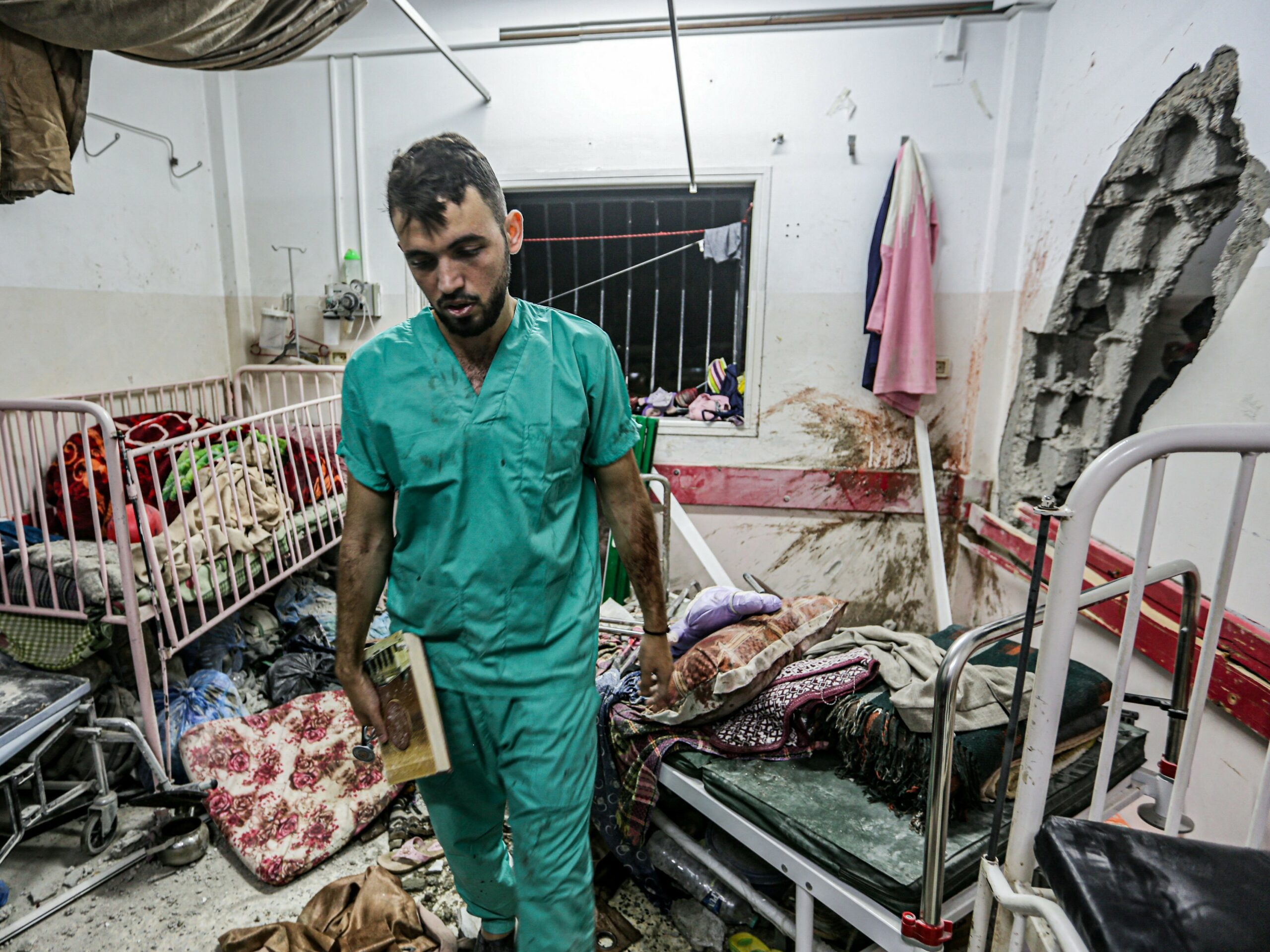 Searching for the remains of hostages, Israeli forces raid another Gaza hospital