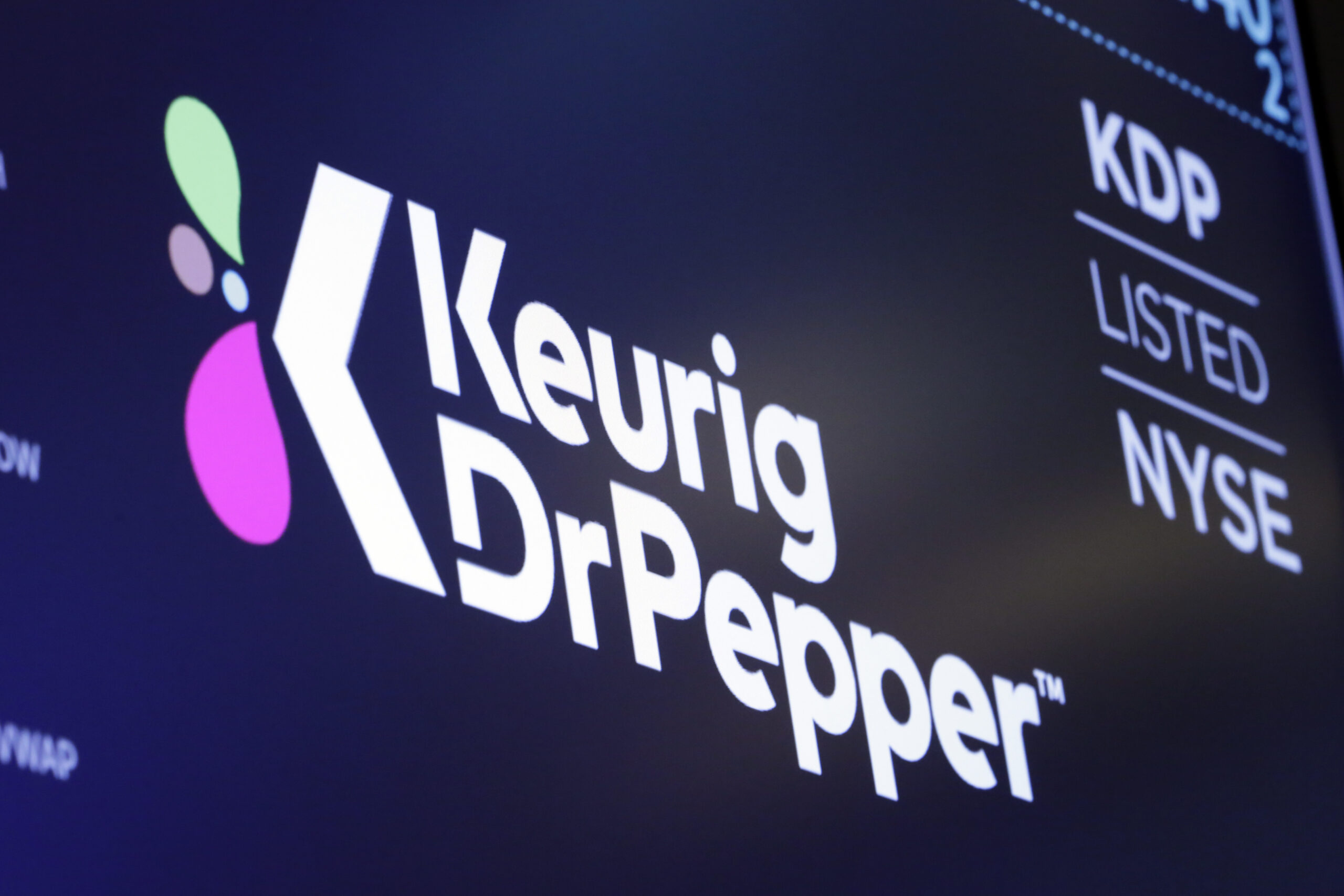 A logo for Keurig Dr Pepper