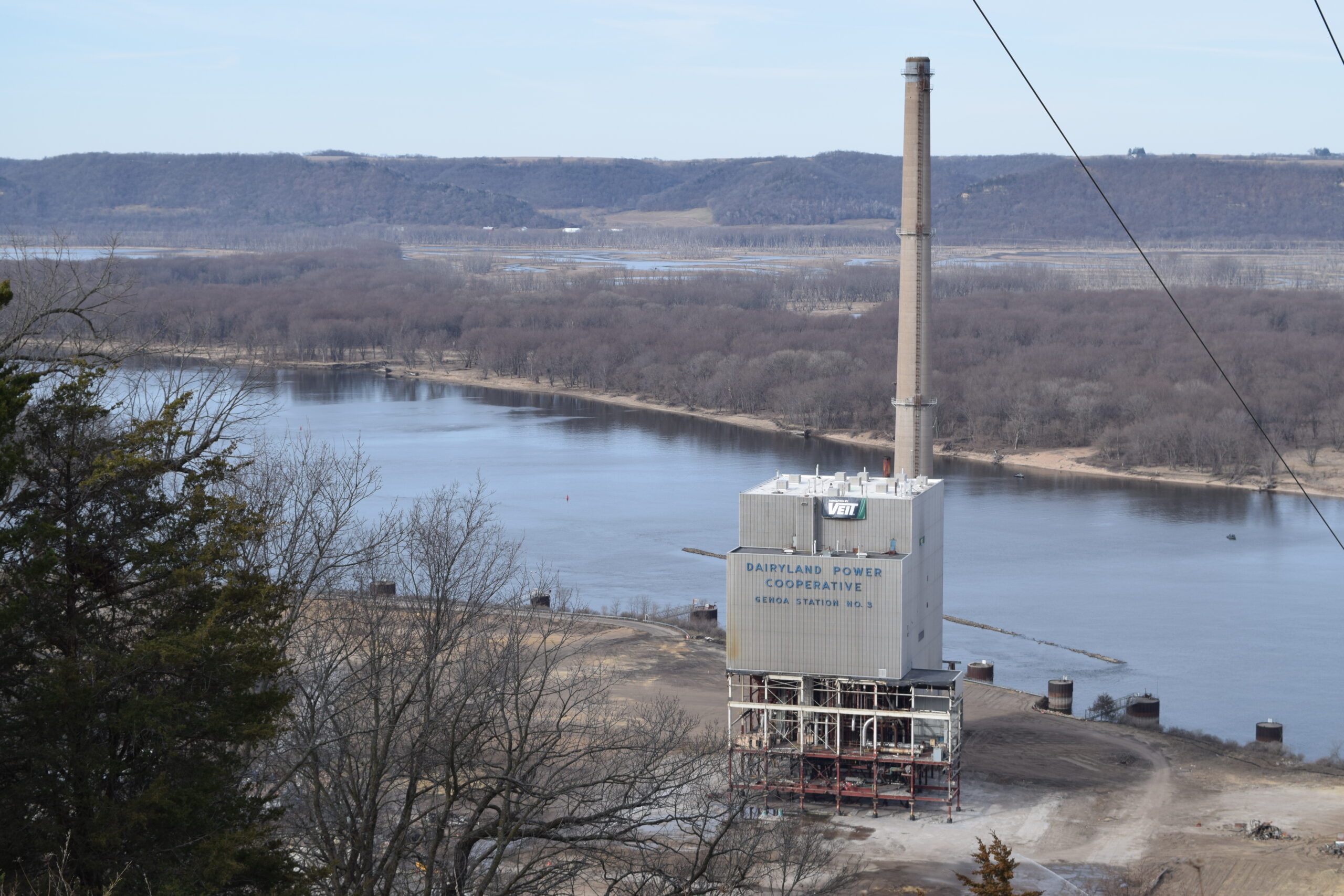 The 500-foot stack towers over the rectangular, steel boiler house on the mostly empty site.