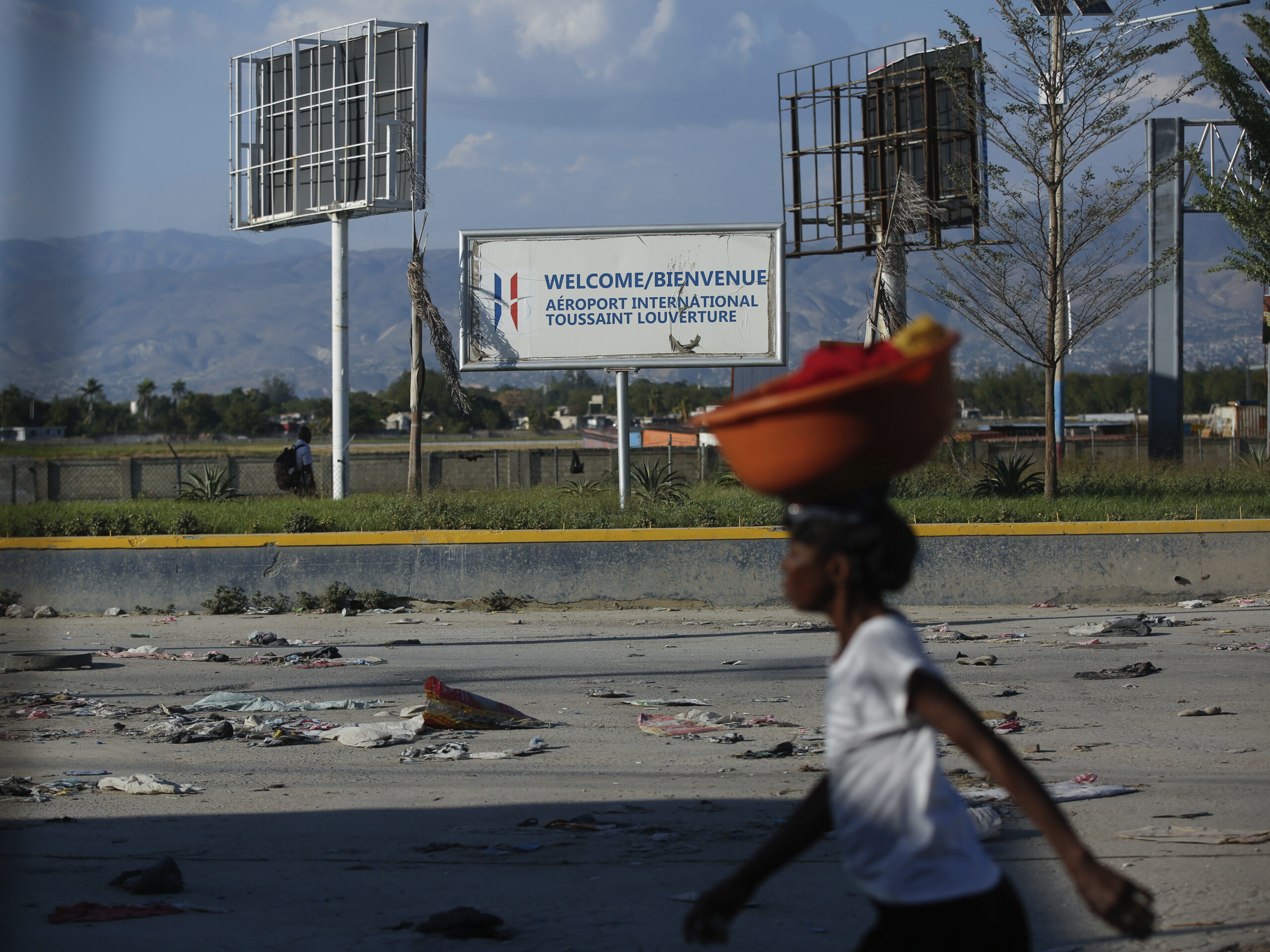Haiti’s prime minister is stranded abroad as gangs threaten ‘civil war’
