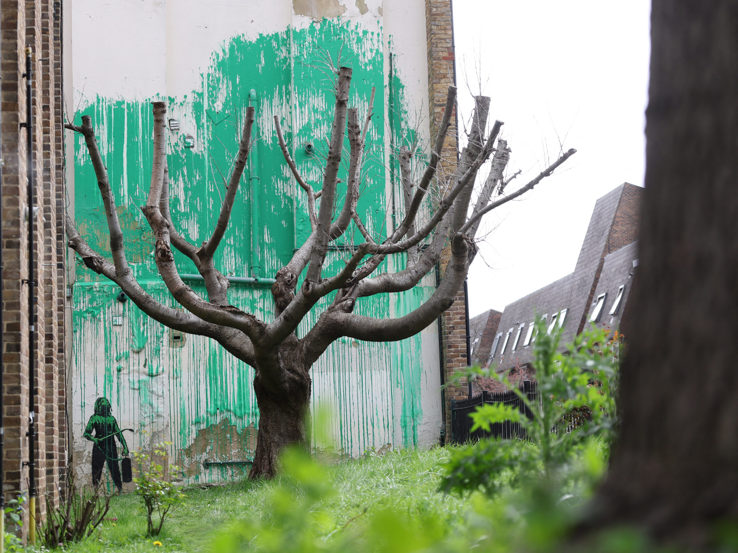 New Banksy mural in north London puts a little greenery in a dense neighborhood