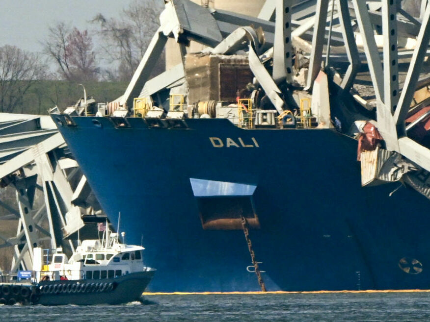 The wreckage of the collapsed Francis Scott Key Bridge lies on top of the container ship Dali in Baltimore, Maryland, on March 29, 2024.