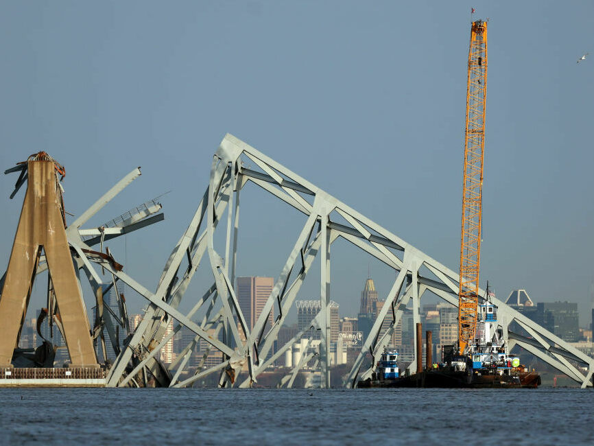 A giant crane arrives in Baltimore, but leaders see a ‘daunting’ cleanup job ahead