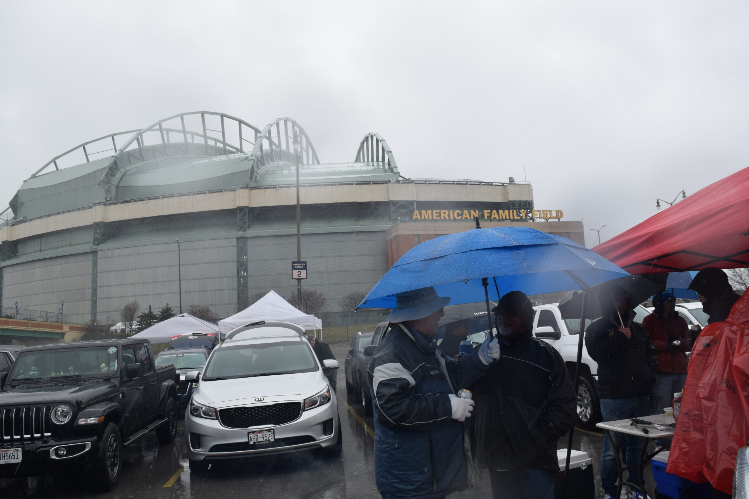 ‘It’s tradition’: Milwaukee Brewers fans brave cold weather, rain to celebrate Opening Day 