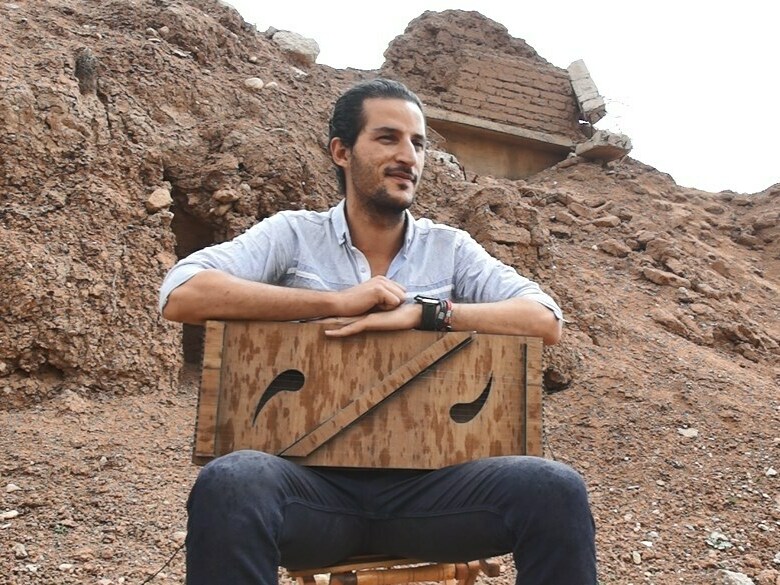 ISIS destroyed his instruments. He made a new one from scraps and composed an album
