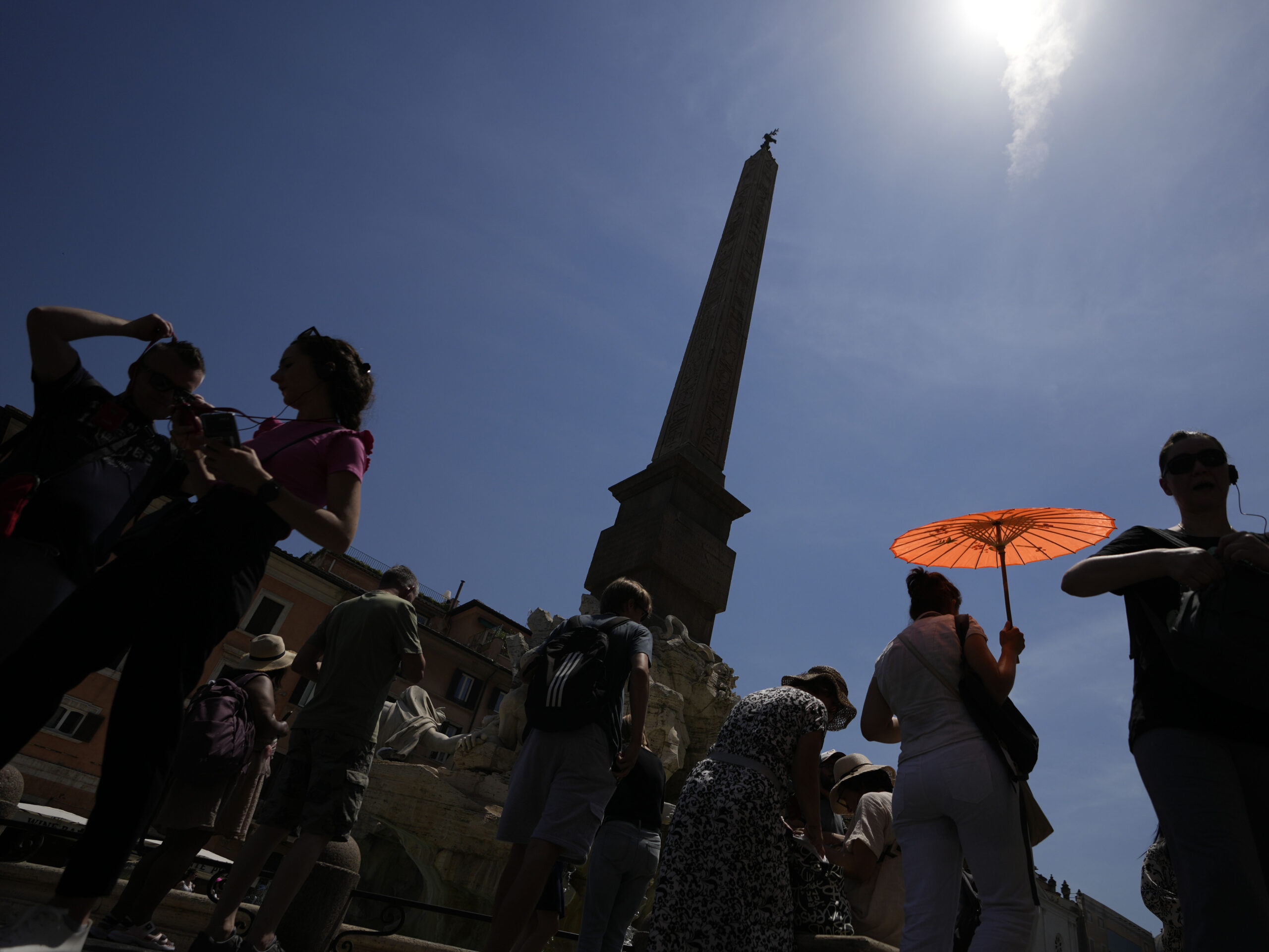 People in the streets of Rom in June 2022. Heat-related deaths in Europe have increased by about 30% in the last 20 years, according to a new report.