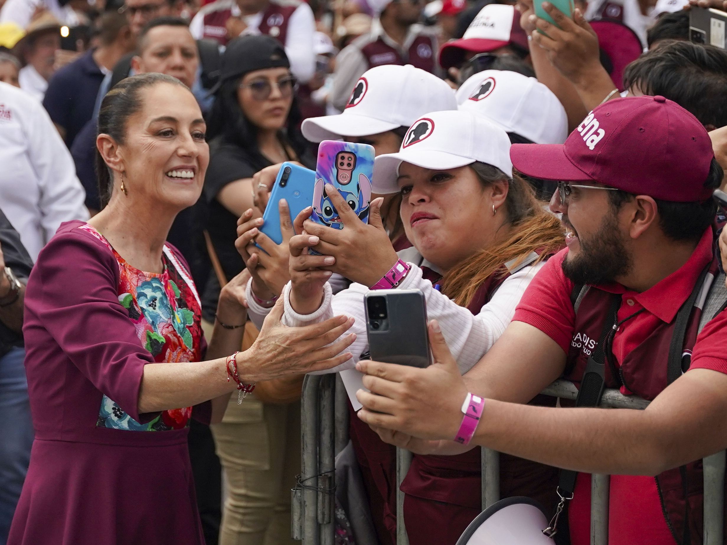 Presidential candidate Claudia Sheinbaum greets supporters upon her arrival to her opening campaign rally at the Zocalo in Mexico City, Friday, March 1, 2024.