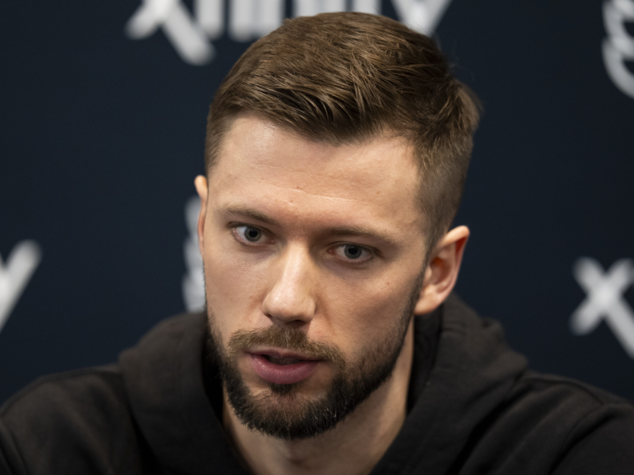 Philadelphia Flyers' Ivan Fedotov takes questions from the media during an NHL hockey press conference, Friday, March 29, 2024, in Voorhees, N.J. Nine years after he was drafted by Philadelphia, goalie Ivan Fedotov has joined the Flyers.(AP Photo/Chris Szagola)