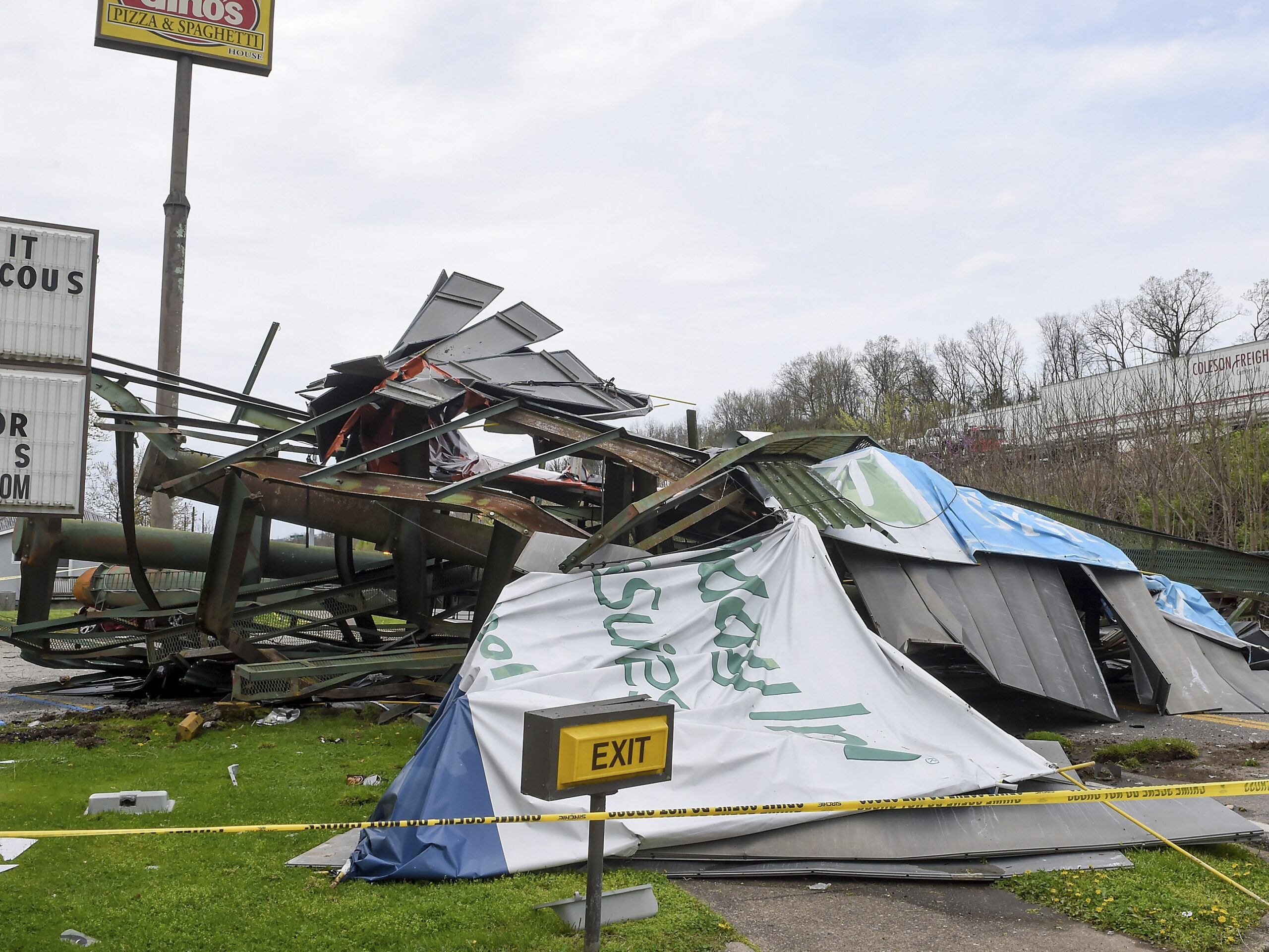A steel billboard and its support were blown over in Dunbar, W.Va., Tuesday, April 2, 2024, after severe storms blew through the area.