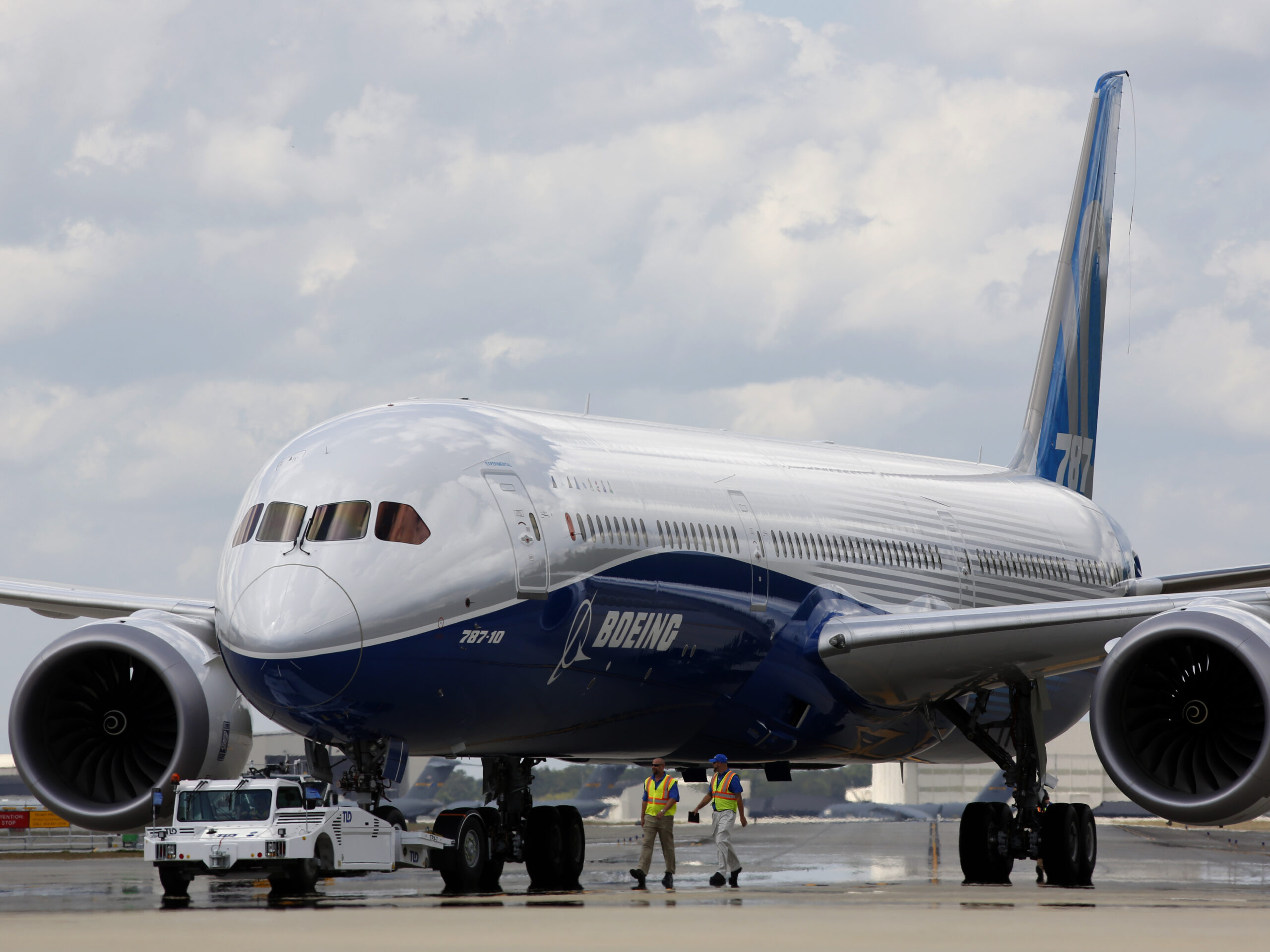 Boeing employees walk the new Boeing 787-10 Dreamliner down towards the delivery ramp area at the company's facility after conducting its first test flight at Charleston International Airport in 2017. A Senate subcommittee has opened an investigation into the safety of Boeing jetliners, intensifying safety concerns about the company's aircraft.