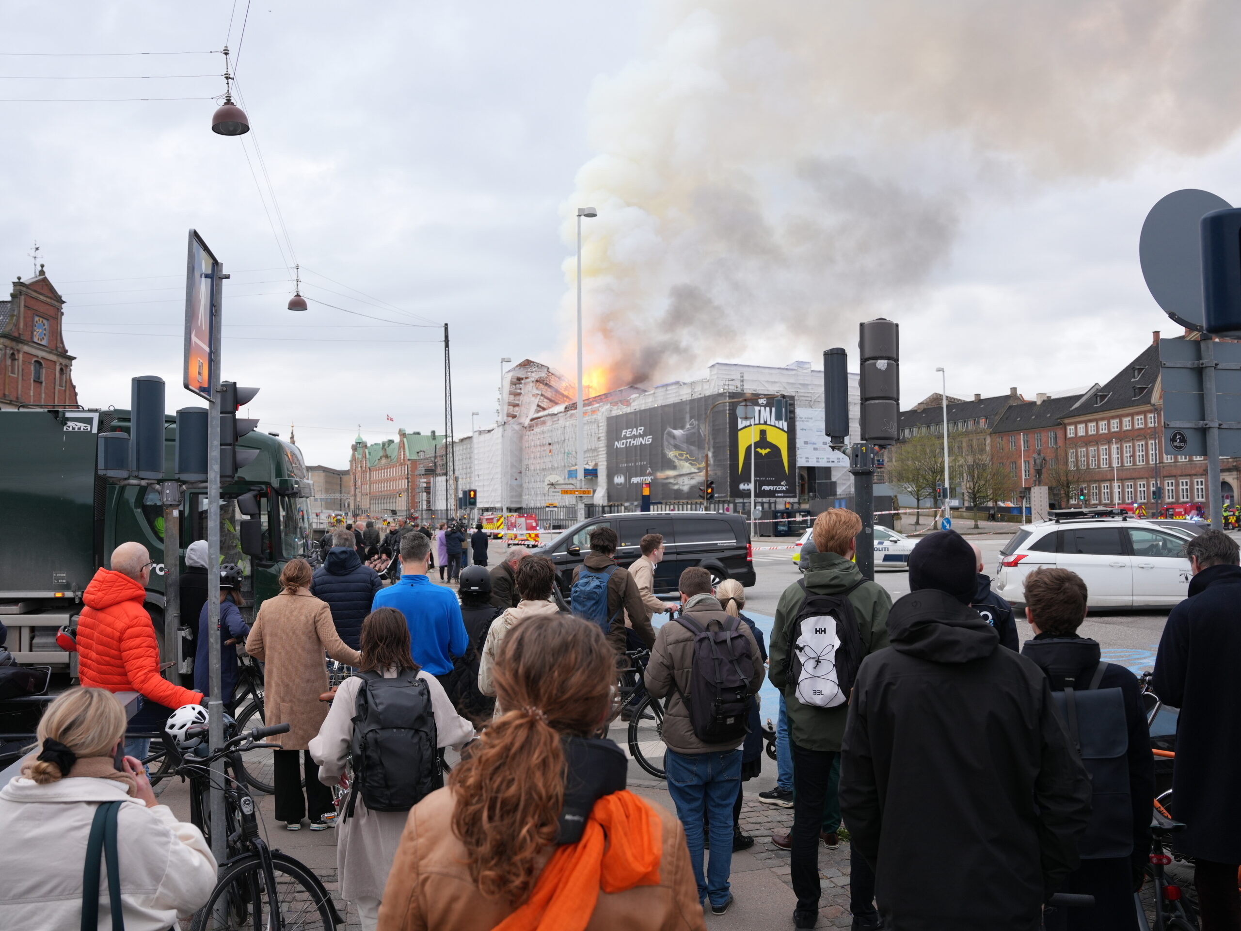 Fire ravages 17th-century Old Stock Exchange in Copenhagen, toppling the iconic spire