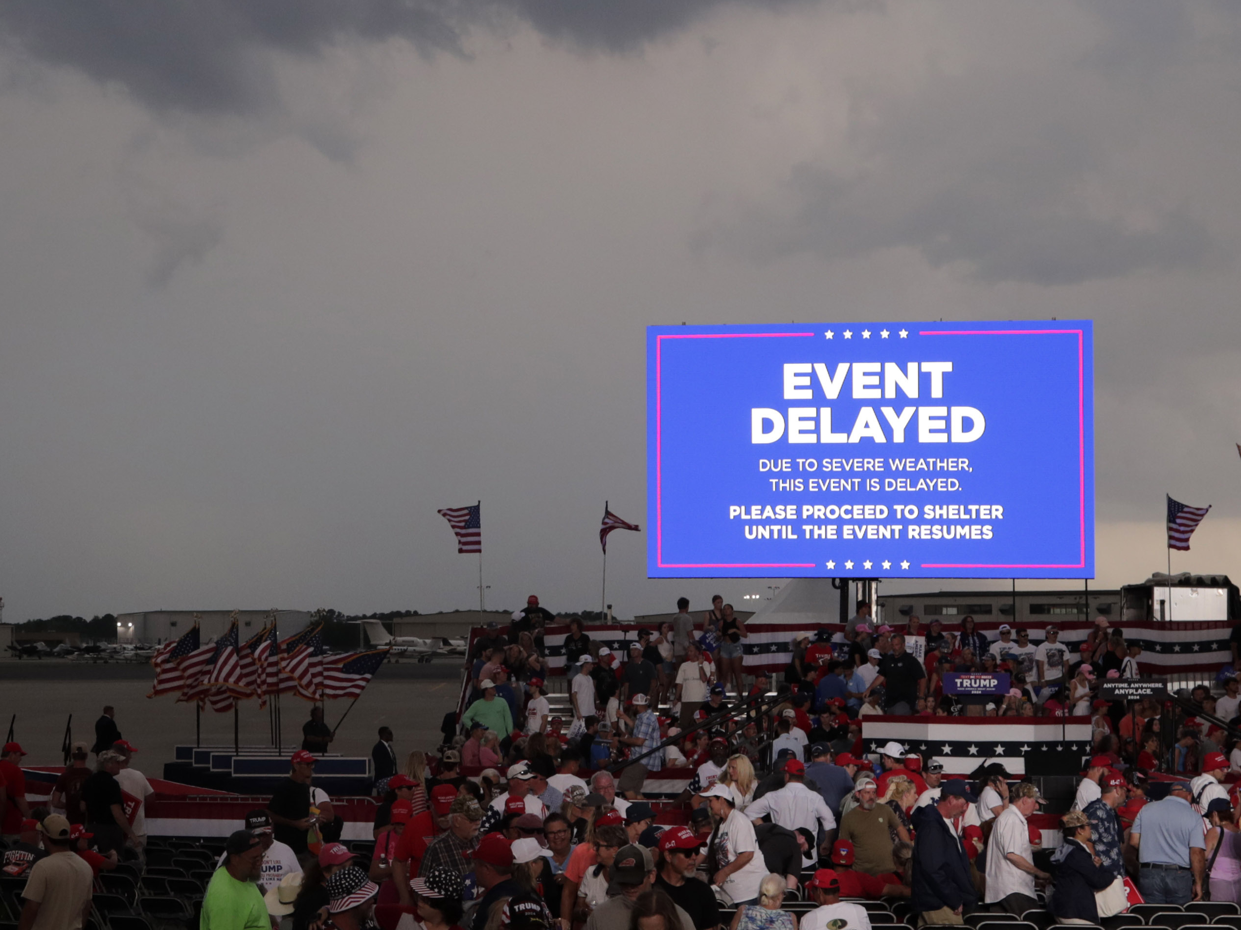 Supporters of former President Donald Trump file out of the rally after it was canceled due to threatening weather in Wilmington, N.C., Saturday, April 20, 2024.