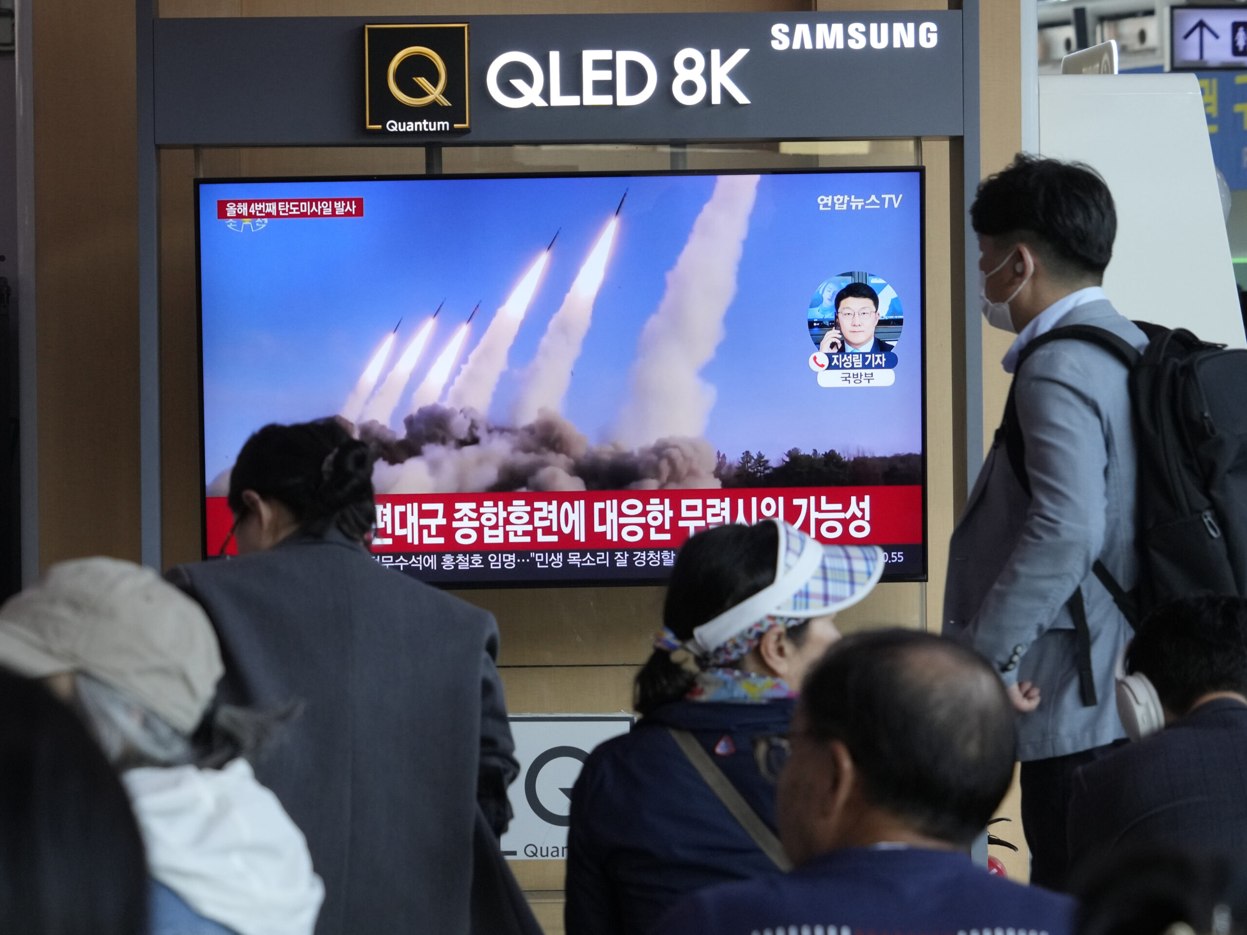 A TV screen shows a file image of North Korea's missiles launch during a news program at the Seoul Railway Station in Seoul, South Korea, Monday, April 22, 2024.