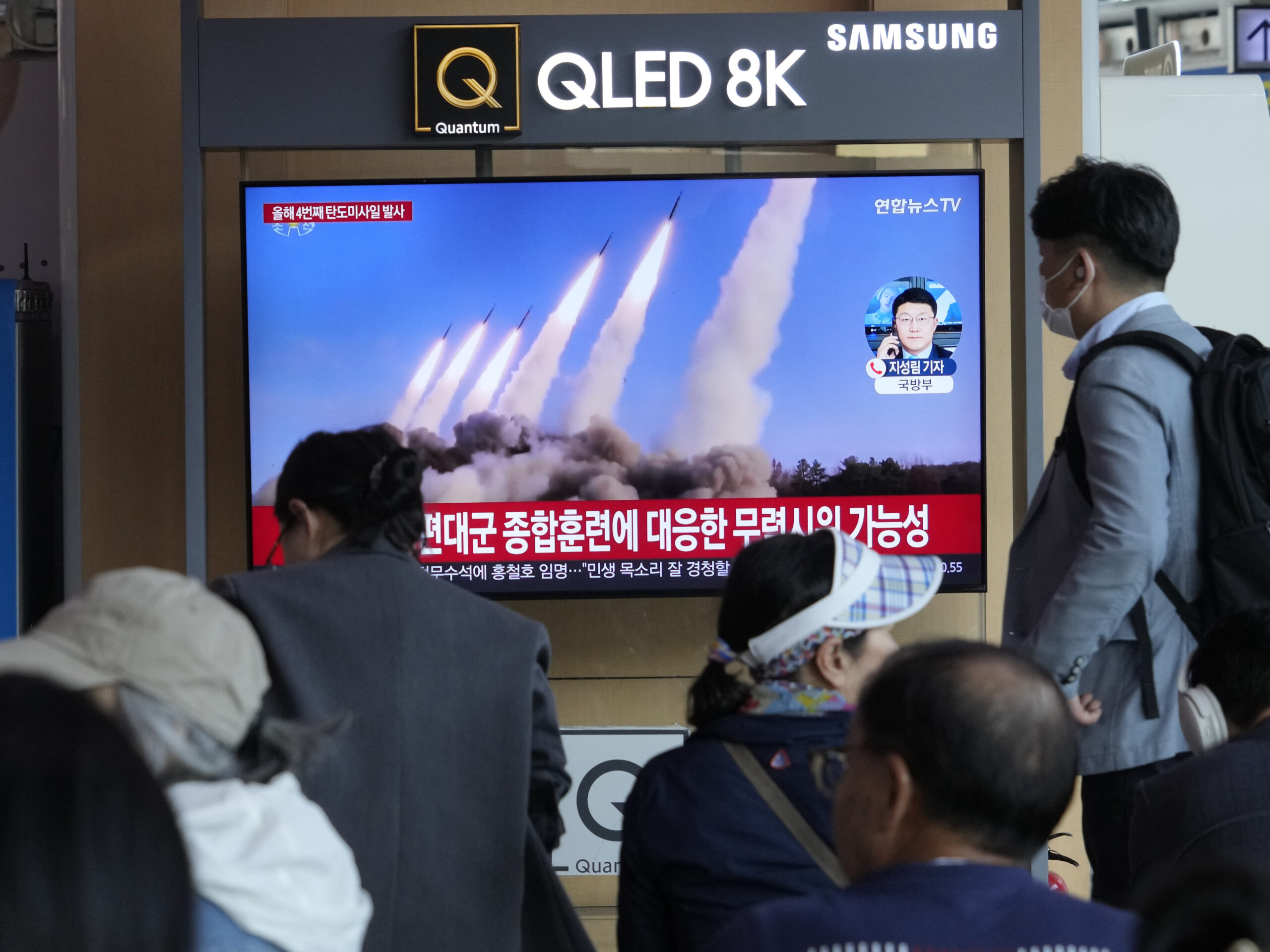 A TV screen shows a file image of a North Korean missile launch during a news program at the Seoul Railway Station in South Korea on April 22, 2024. North Korea fired multiple suspected short-range ballistic missiles toward its eastern waters on Monday, South Korea's military said.