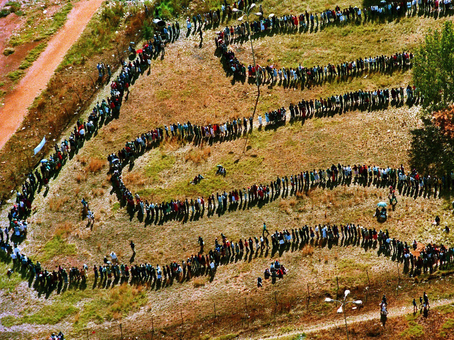 People queue to cast their votes In Soweto, South Africa April 27, 1994, in the country's first all-race elections. South Africans celebrate "Freedom Day" every April 27.