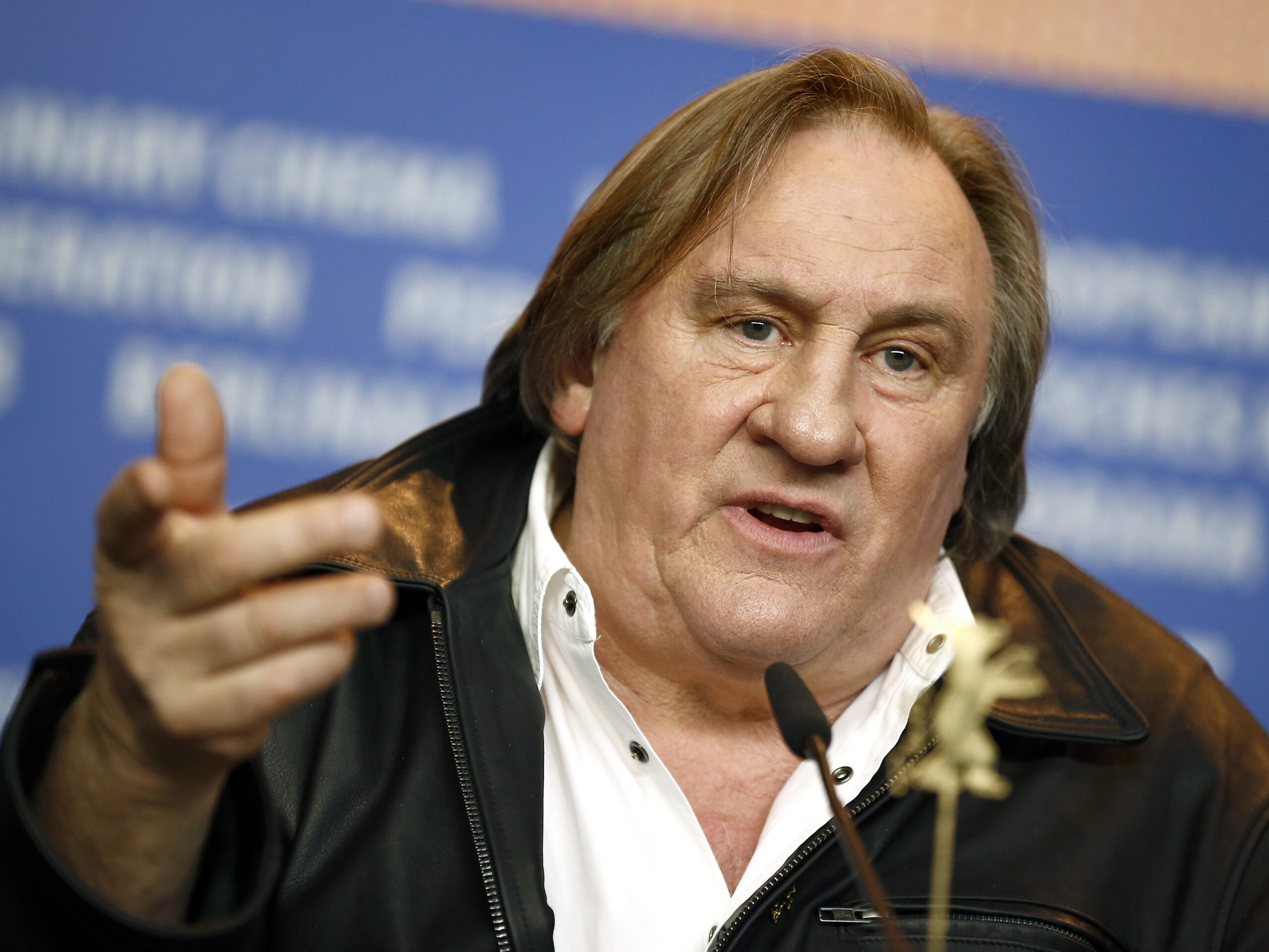 Actor Gerard Depardieu addresses the media during the press conference for the film 'Saint Amour' at the 2016 Berlinale Film Festival in Berlin, Germany, Friday, Feb. 19, 2016.