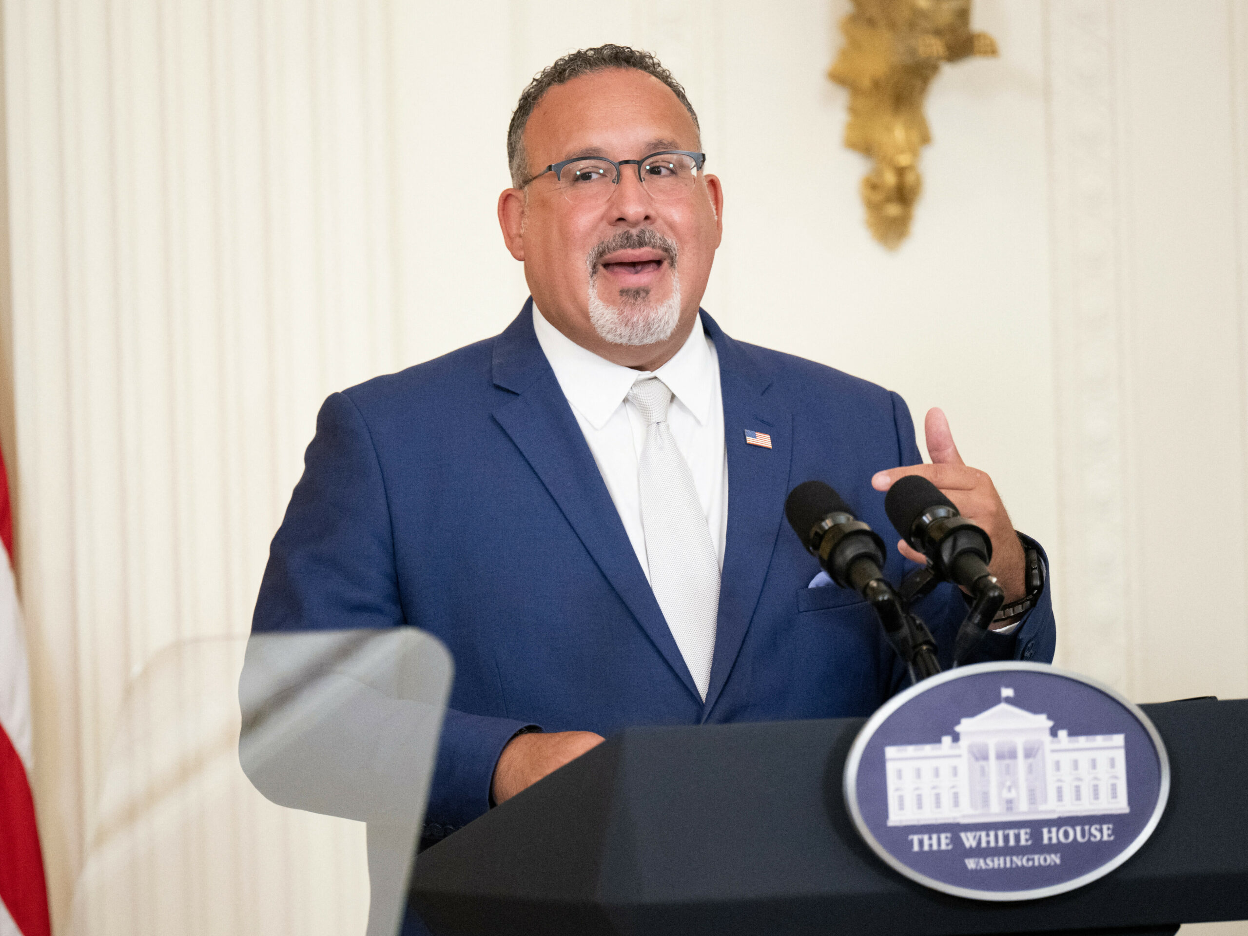 "Our nation's educational institutions should be places where we not only accept differences, but celebrate them," U.S. Education Secretary Miguel Cardona, seen in the East Room of the White House in August 2023, said of the new Title IX regulation.