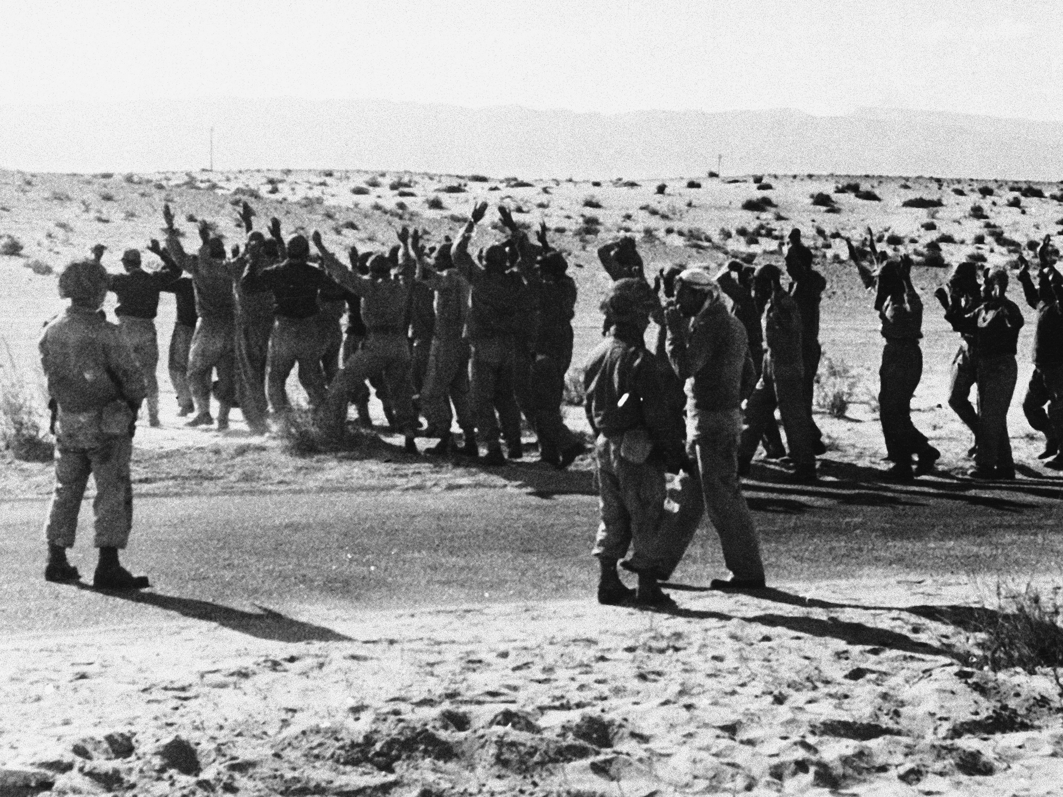 Israeli troops round up Egyptian soldiers captured during fighting in 1956 in the Rafah area of the Gaza Strip, which was controlled by Egypt at the time. Israel, Britain and France invaded Egyptian territory after Egypt moved to nationalize the Suez Canal. But U.S. President Dwight Eisenhower intervened, leading to the withdrawal of foreign troops, including the Israeli forces in Gaza.