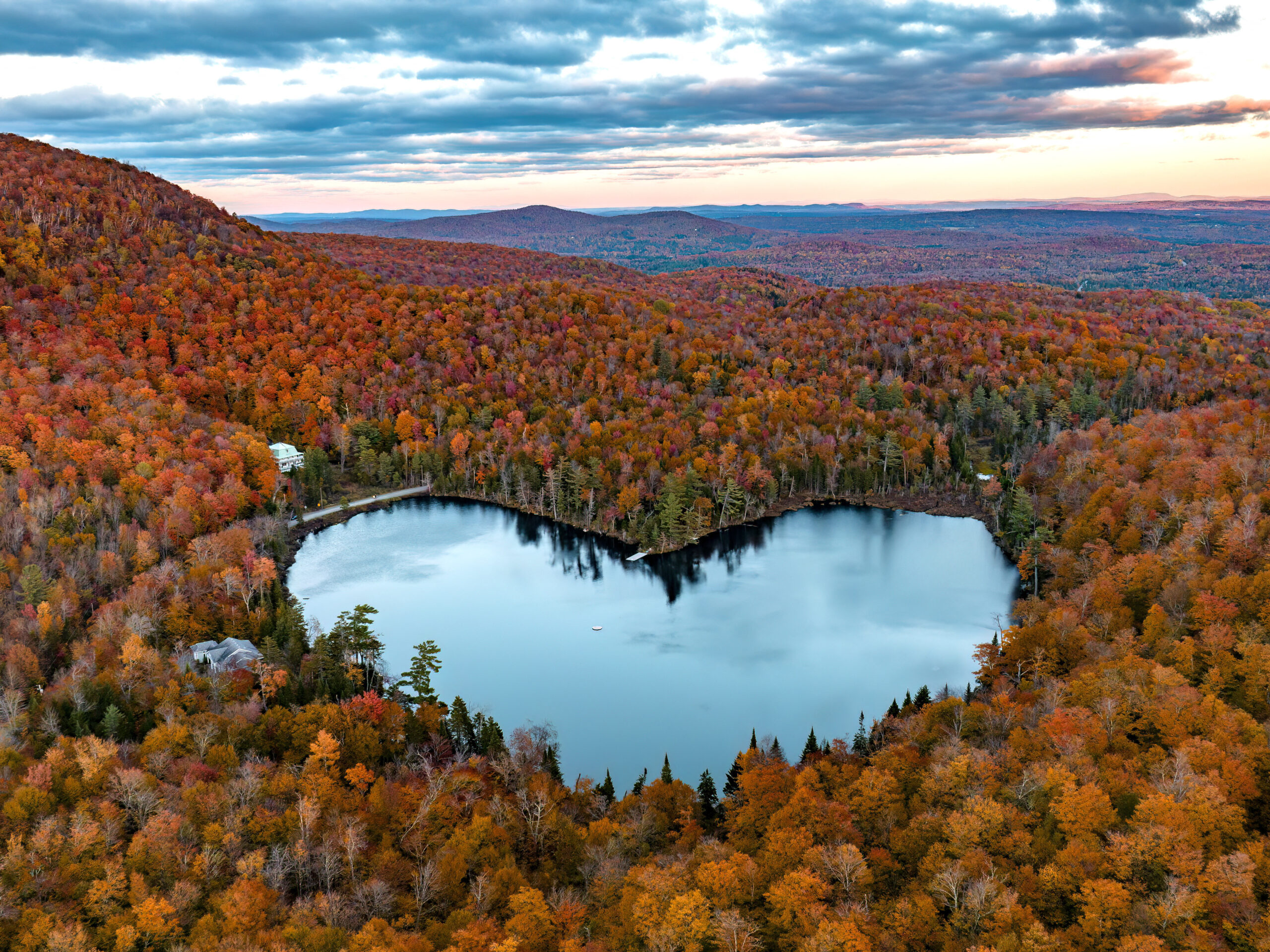 The trees in this photo are amazing (and not just because they happen to be growing in a very Instagrammable heart shape around Baker Lake in Quebec, Canada.) Read on for a tree appreciation reading list for Arbor Day.