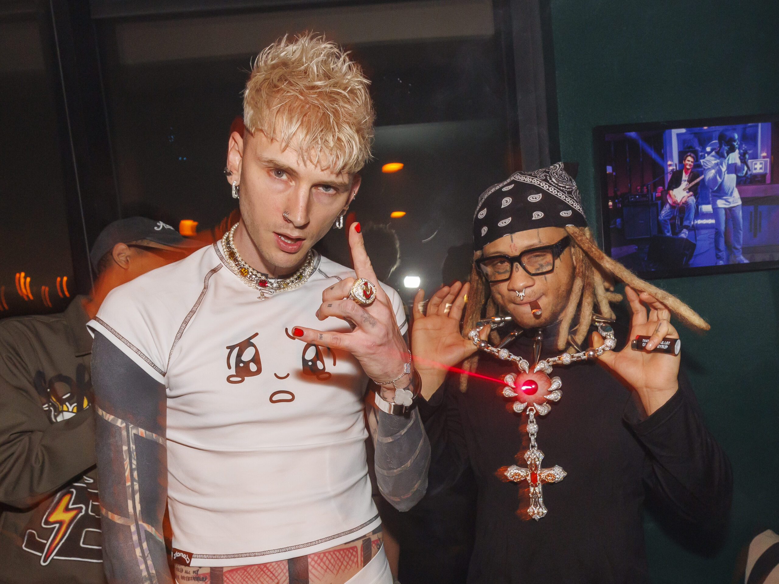 MGK (Machine Gun Kelly) and Trippie Redd at the March 21 listening party for their collaborative EP, genre : sadboy, at Harriet's Rooftop in West Hollywood.