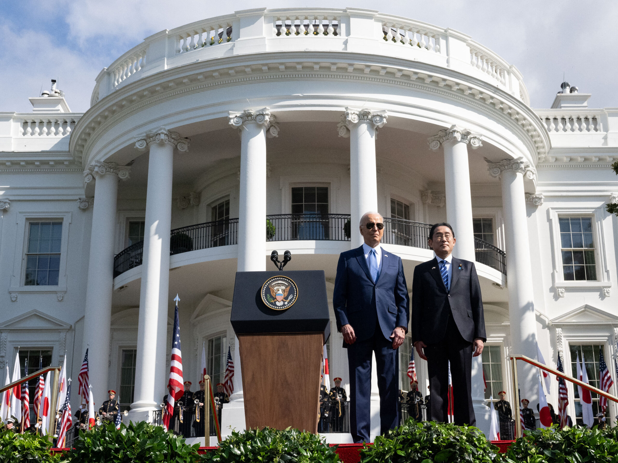President Biden and Japanese Prime Minister Fumio Kishida stand together during a state visit ceremony at the White House.