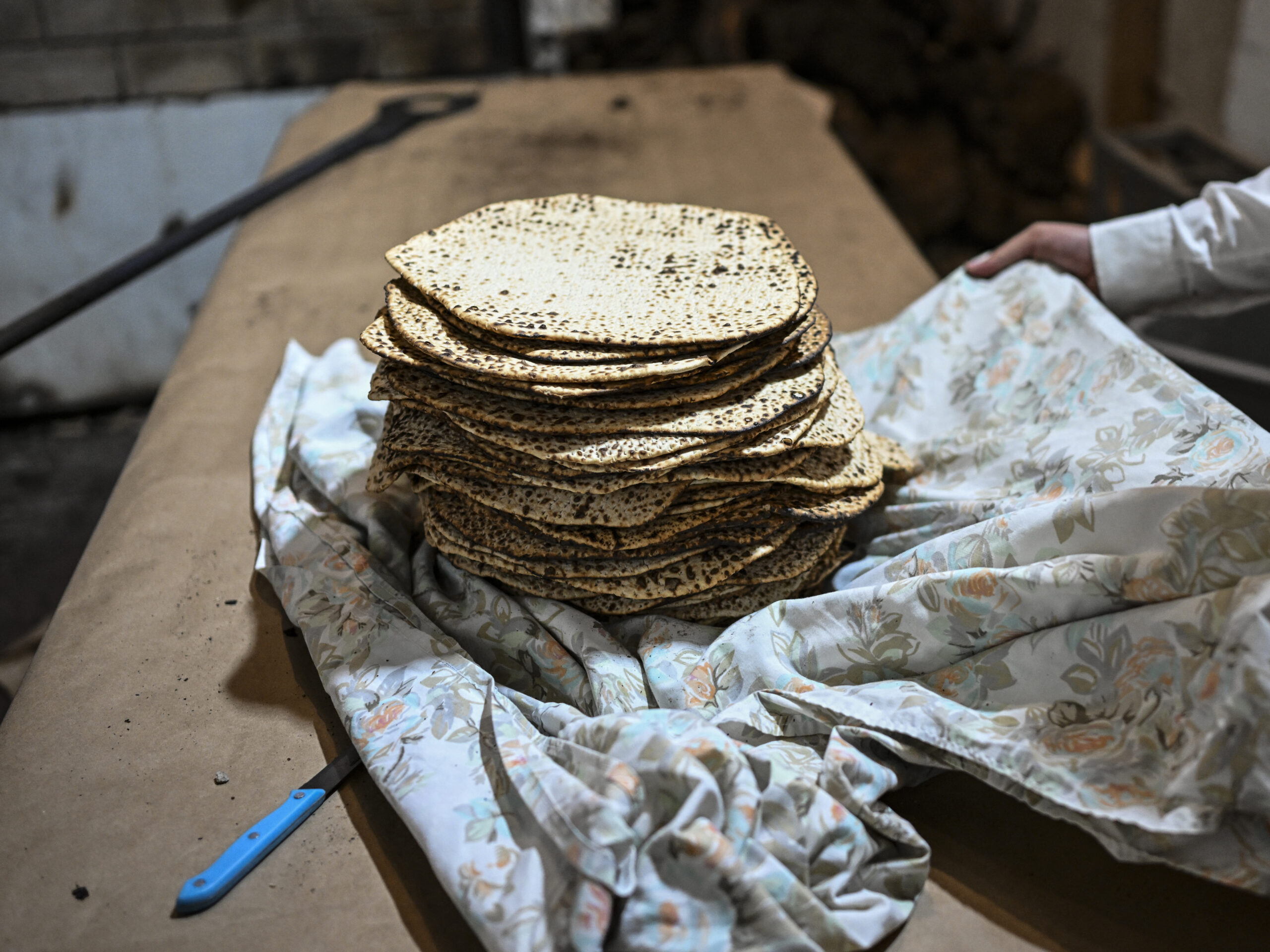 Although matzo sold in supermarkets is typically square, the round matzo is believed to be the earliest form of this unleavened bread that is eaten during the Passover holiday as a symbol of both suffering and freedom.