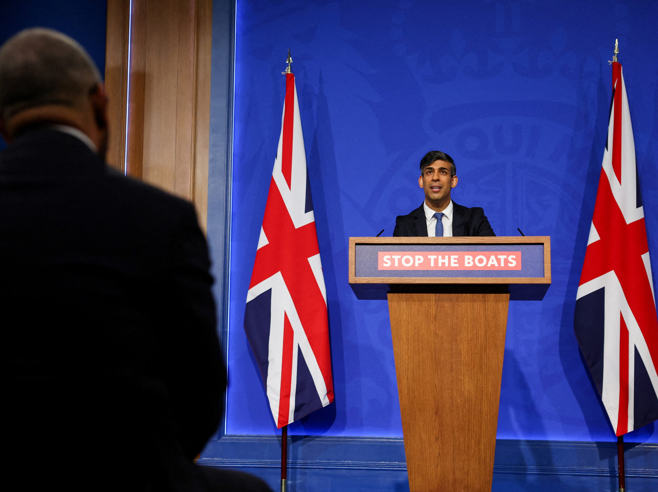 British Prime Minister Rishi Sunak speaks during a press conference in London on Monday regarding a treaty between Britain and Rwanda to transfer asylum-seekers to the African country.
