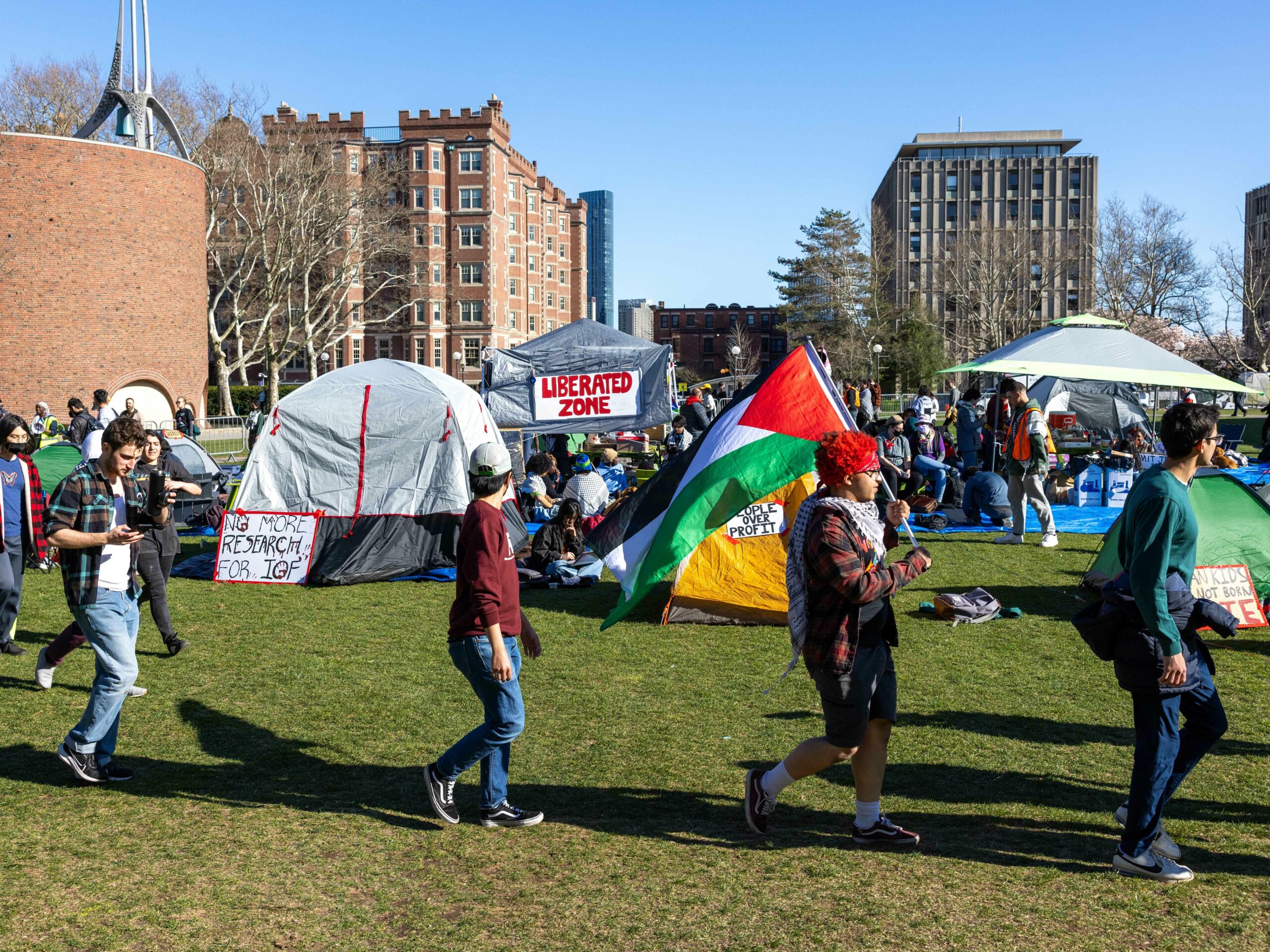 Students from MIT, Harvard University and others rally at a protest encampment at MIT's Kresge Lawn in Cambridge, Massachusetts on Monday.