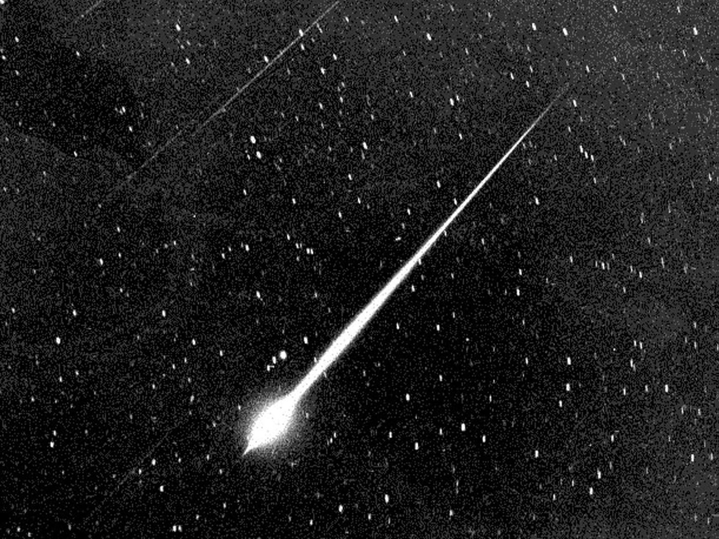 A Leonid fireball is shown during the storm of 1966 in the sky above Wrightwood, Calif.
