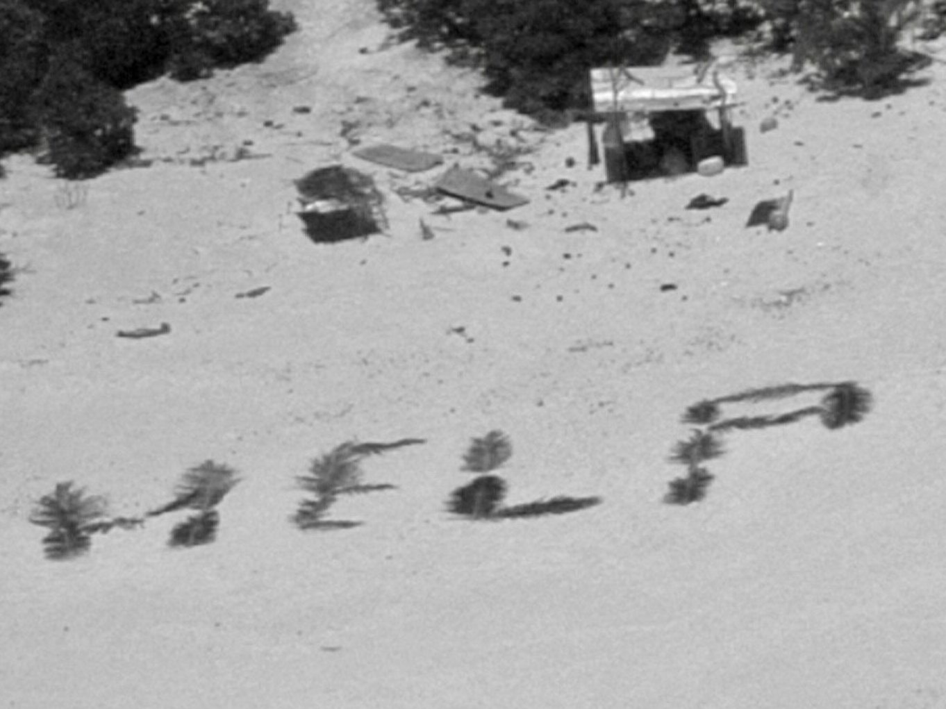 3 men stranded on a Pacific island were rescued by spelling ‘help’ with palm leaves