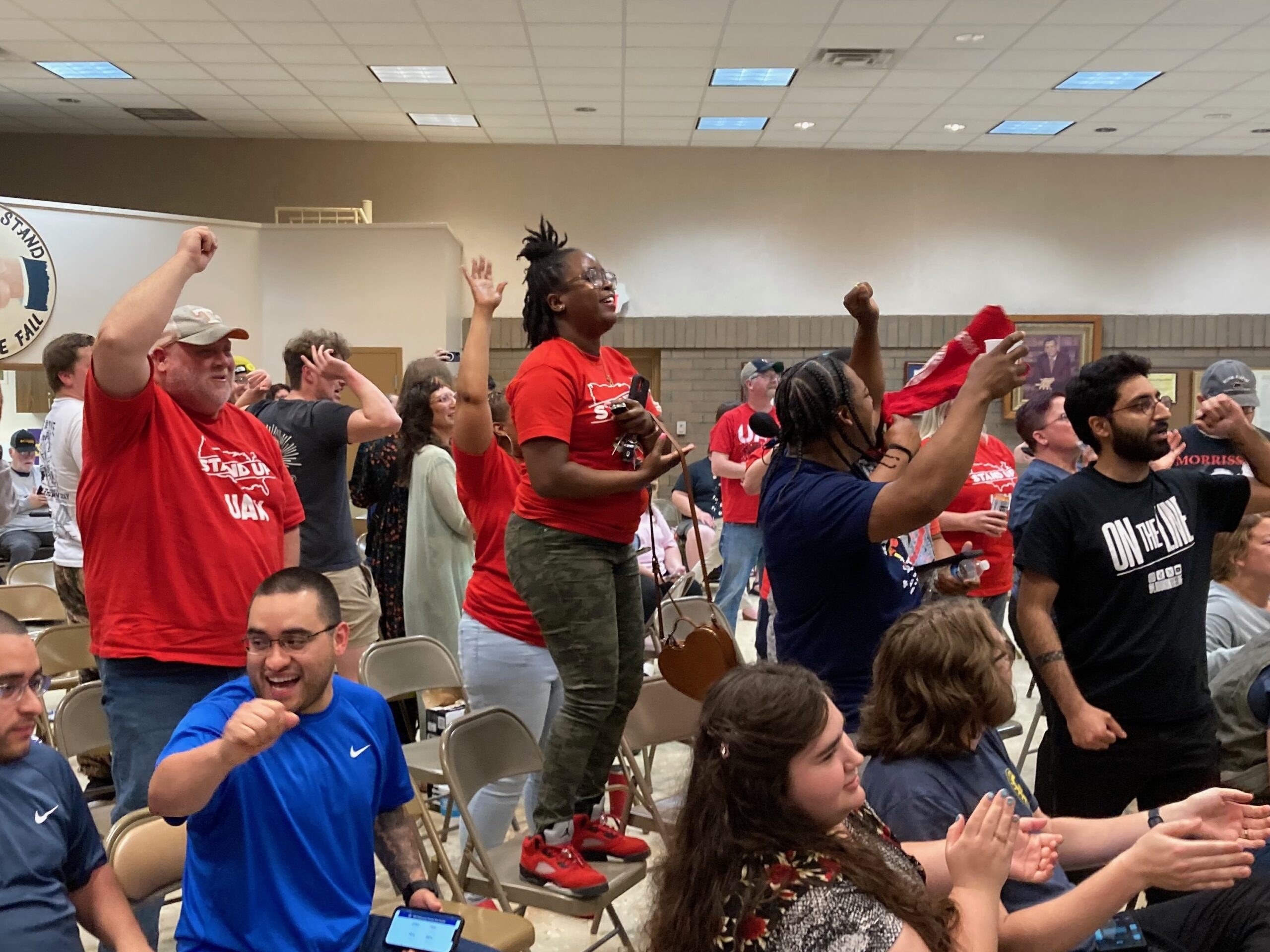 Volkswagen workers and union supporters celebrate at a UAW watch party in Chattanooga, Tenn., on April 19, 2024.