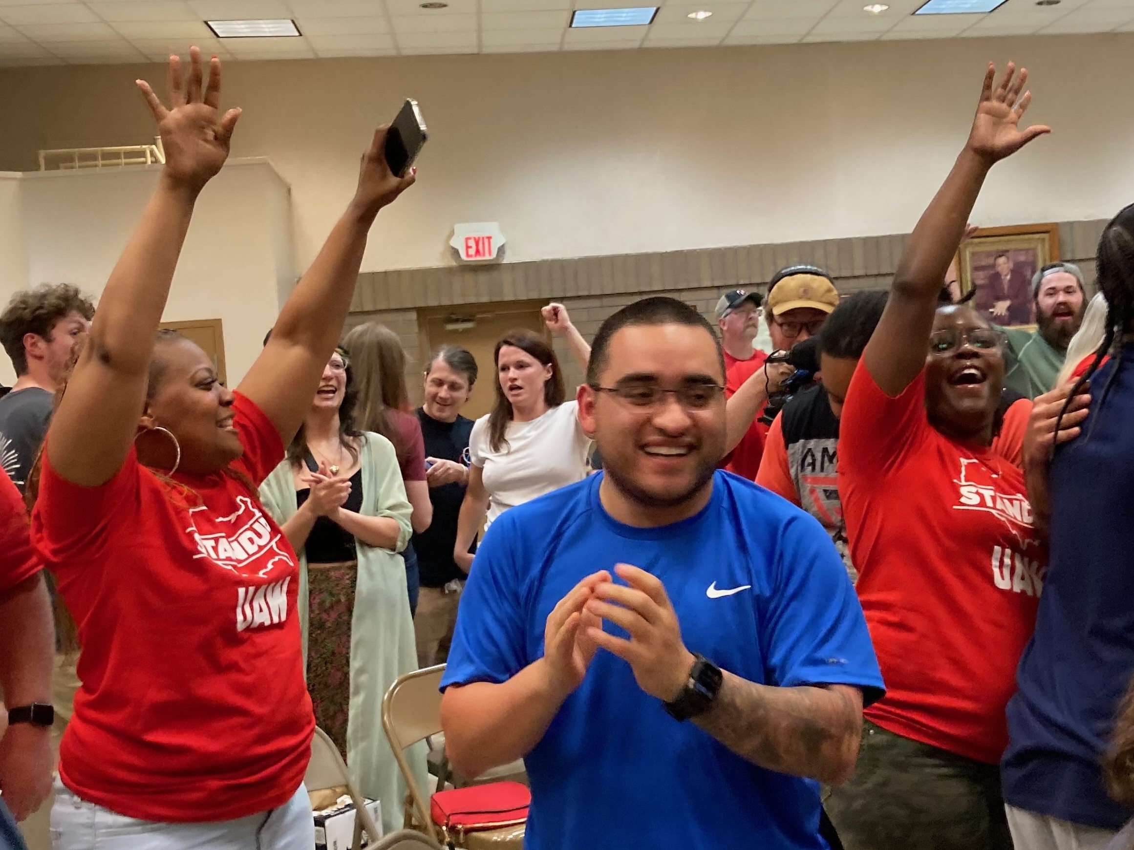 Volkswagen workers in Chattanooga, Tenn., celebrate as results from the union election at the auto plant come in on April 19, 2024. The final tally was 2,628 votes in favor of unionizing and 985 against.