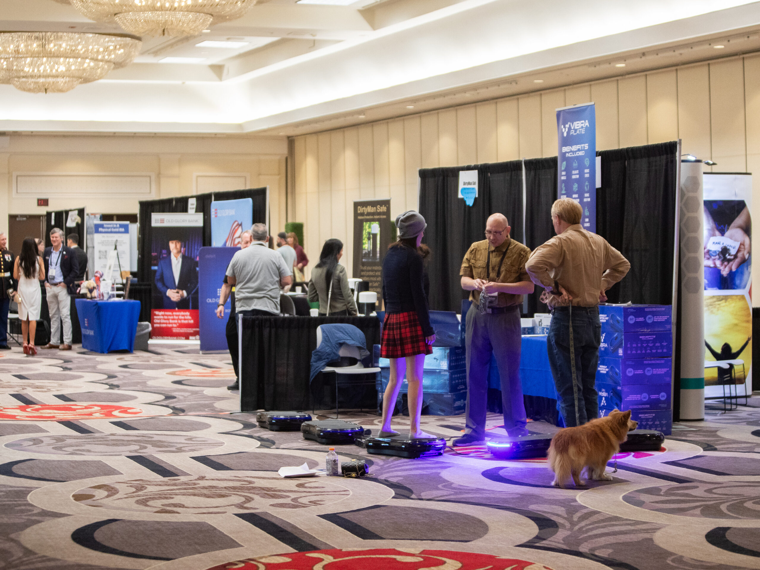 Attendees visit booths at the RePlatform conference in Las Vegas in March. The conference crowd was a hybrid of anti-vaccine activists, supporters of former President Donald Trump and Christian conservatives.