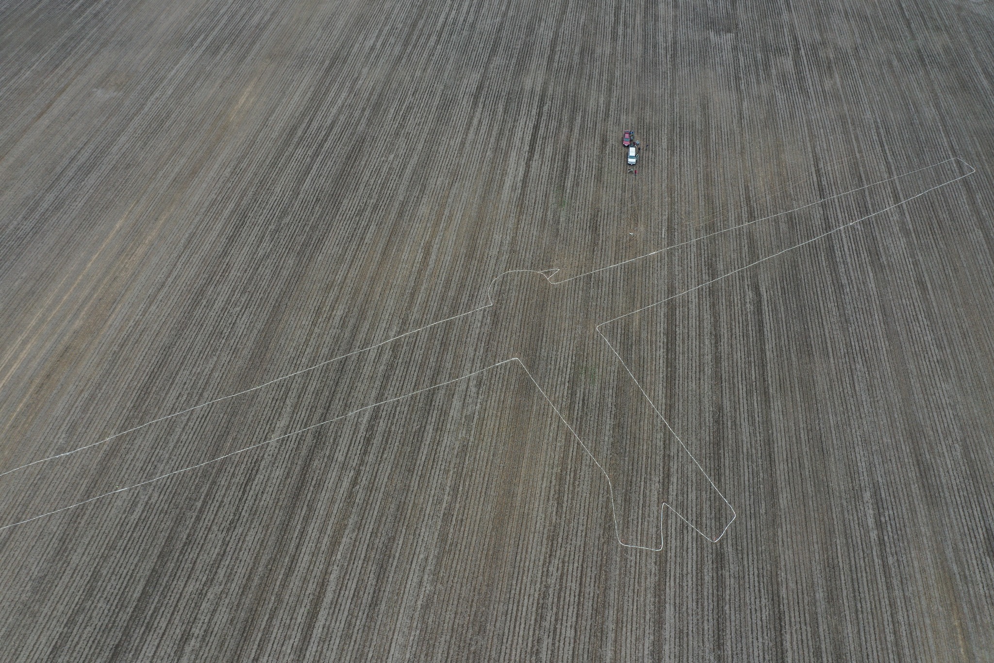 Aerial image of an effigy mound outlined in chalk in the shape of an eagle with a wide wingspan