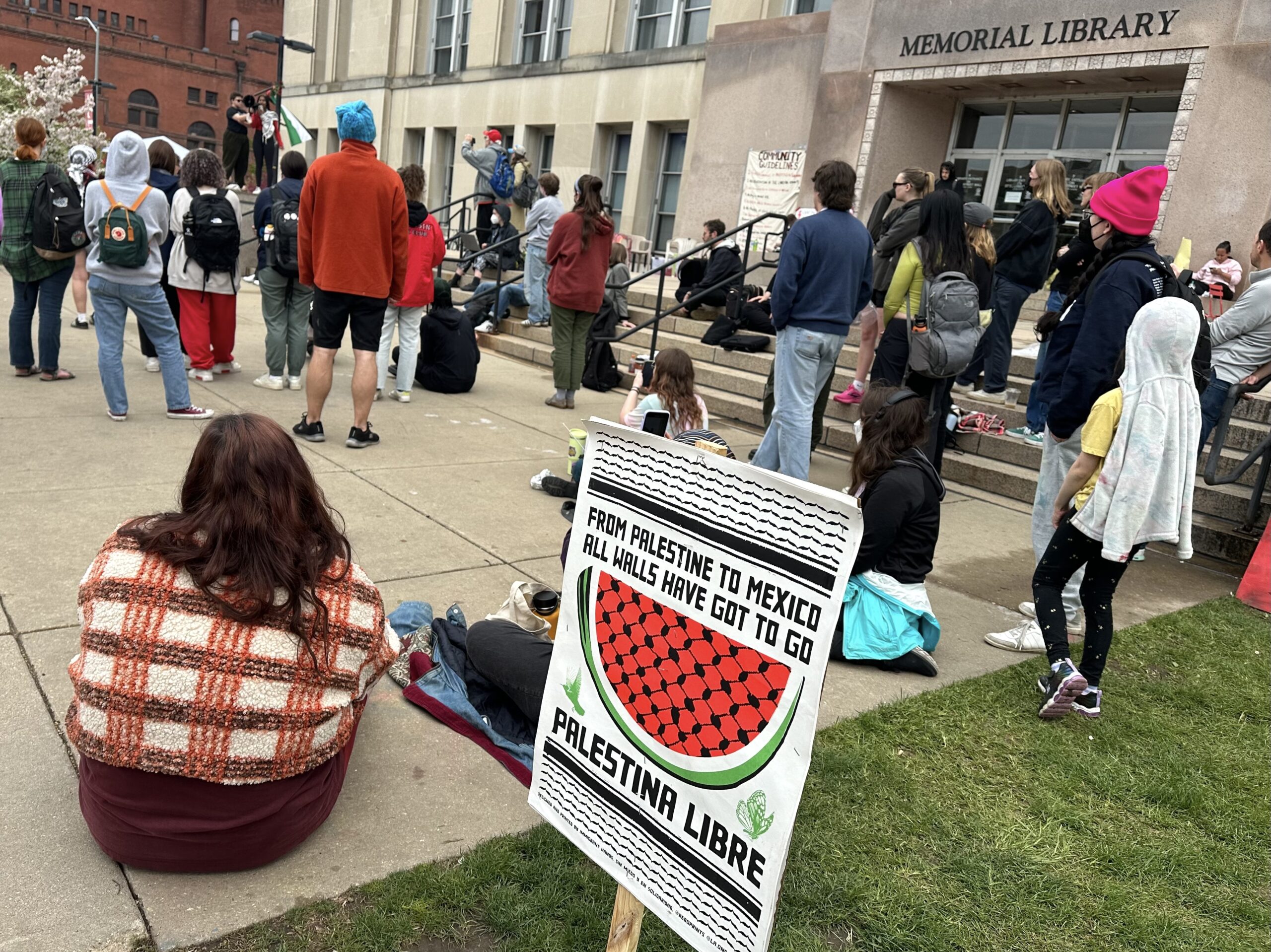 Supporters of a pro-Palestinian encampment at UW-Madison listen to student speakers on Thursday, May 2. 