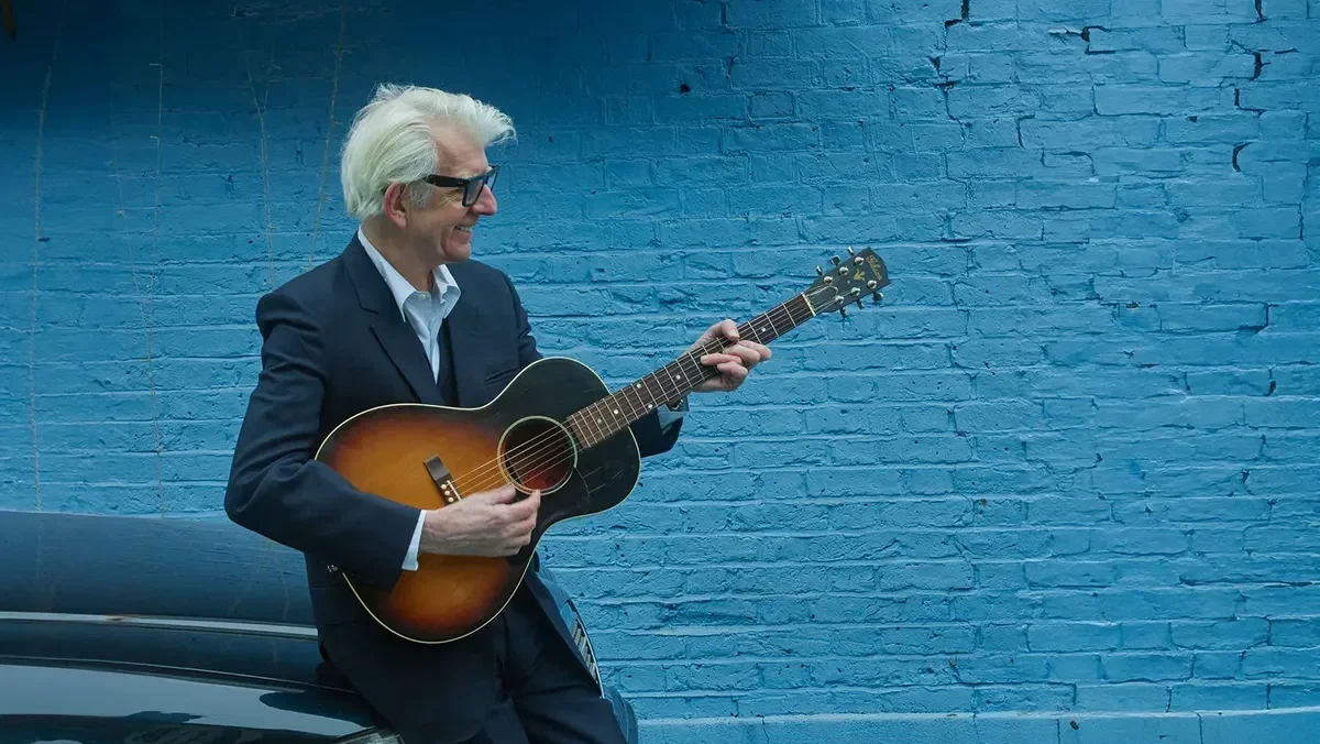 (What’s So Funny ‘Bout) Nick Lowe, Los Straitjackets and ‘Indoor Safari’