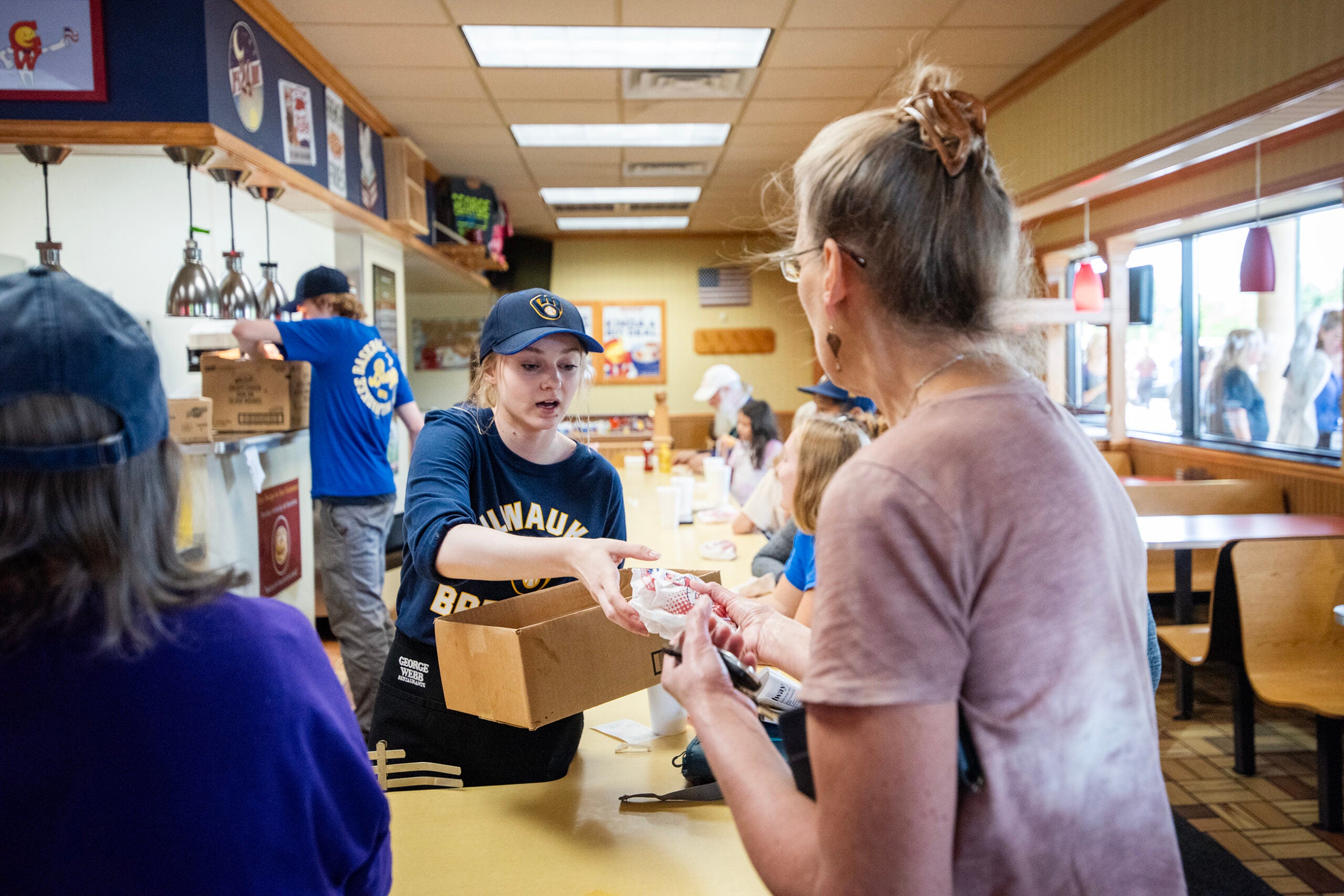 ‘This is just fun’: Thousands flock to George Webb to get their hands on a free burger