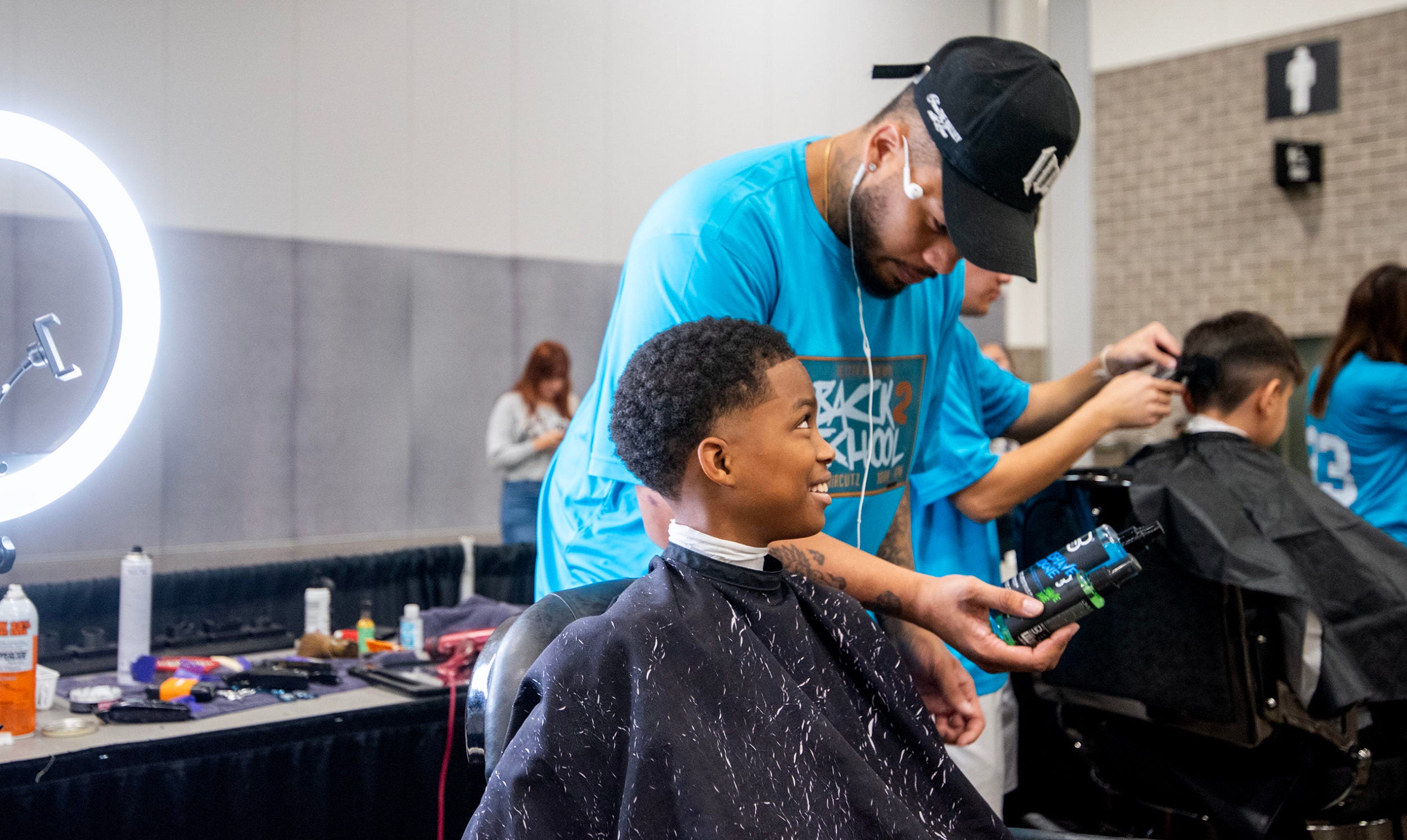 Free haircuts, school supply giveaways help ease rising costs of back-to-school